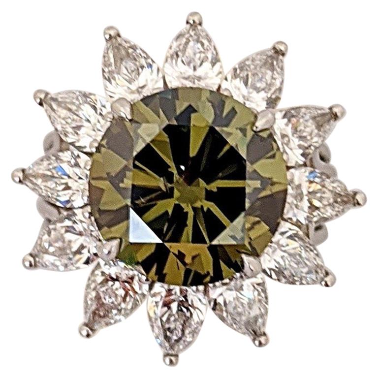 Certified 5.04 Carat Fancy Yellow Green Diamond Platinum Ring For Sale