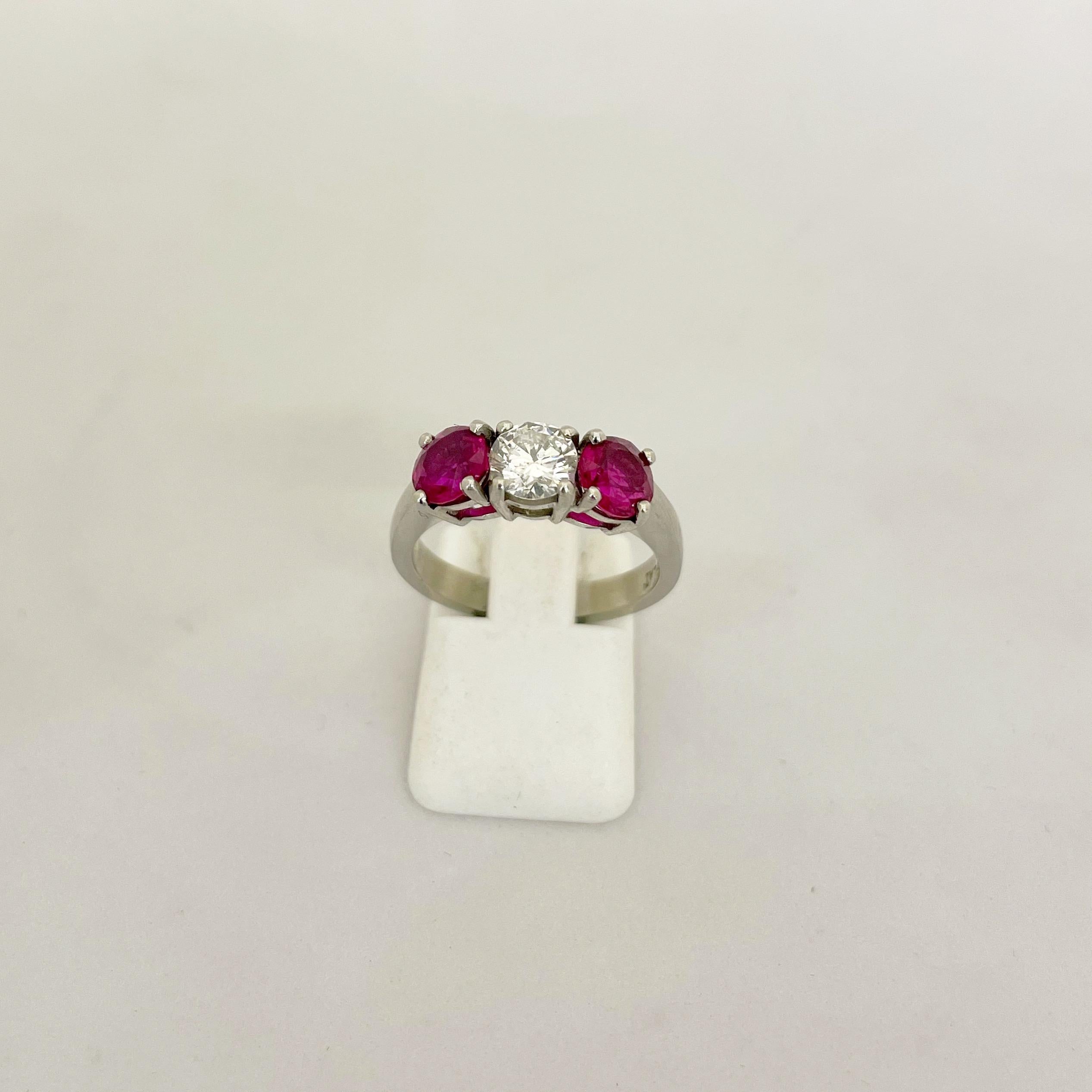 Platinum 3 Stone, 1.63 Carat Ruby and .61 Carat Diamond Ring For Sale 1