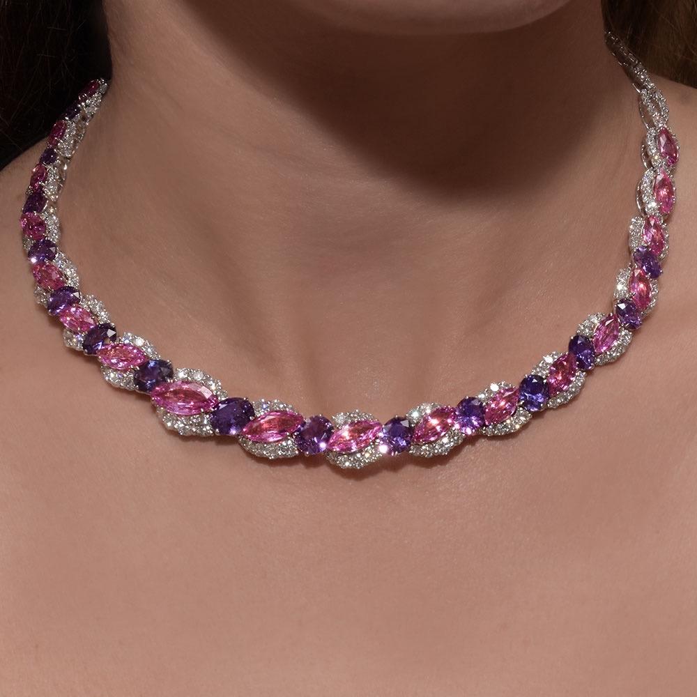 Magnificent necklace designed by Cellini NYC  with the most beautiful marquis pink sapphires and oval purple sapphires. Each stone is set with round brilliant diamonds in this platinum and 18 karat white gold graceful setting. The clasp is finished