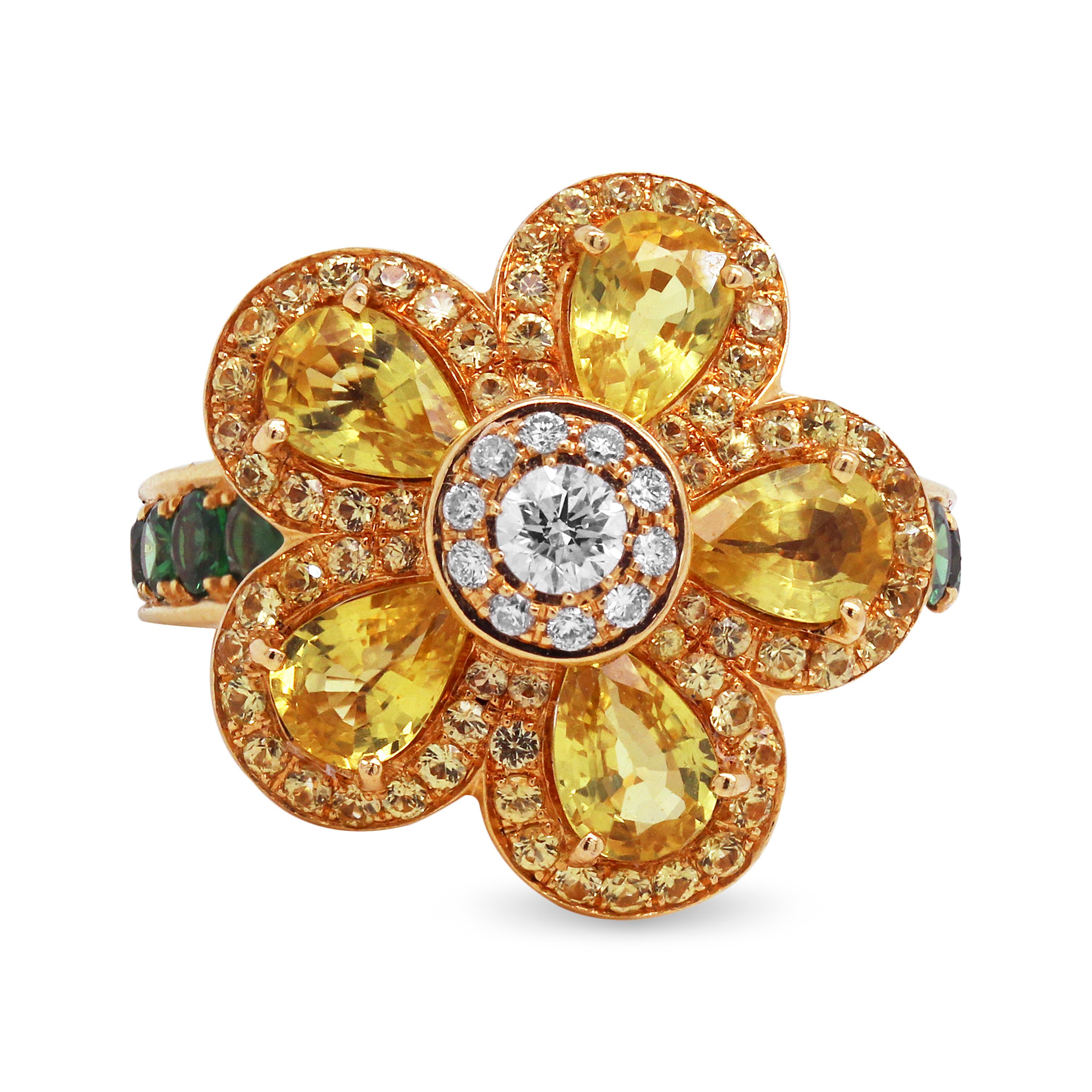Cellini Yellow Sapphire Tsavorite 18K Yellow Gold Diamond Floral Cocktail Ring

A unique flower sits on this ring set with pearshape and round yellow sapphires and a diamond center. Tsavorite are set half way across the band which creates a
