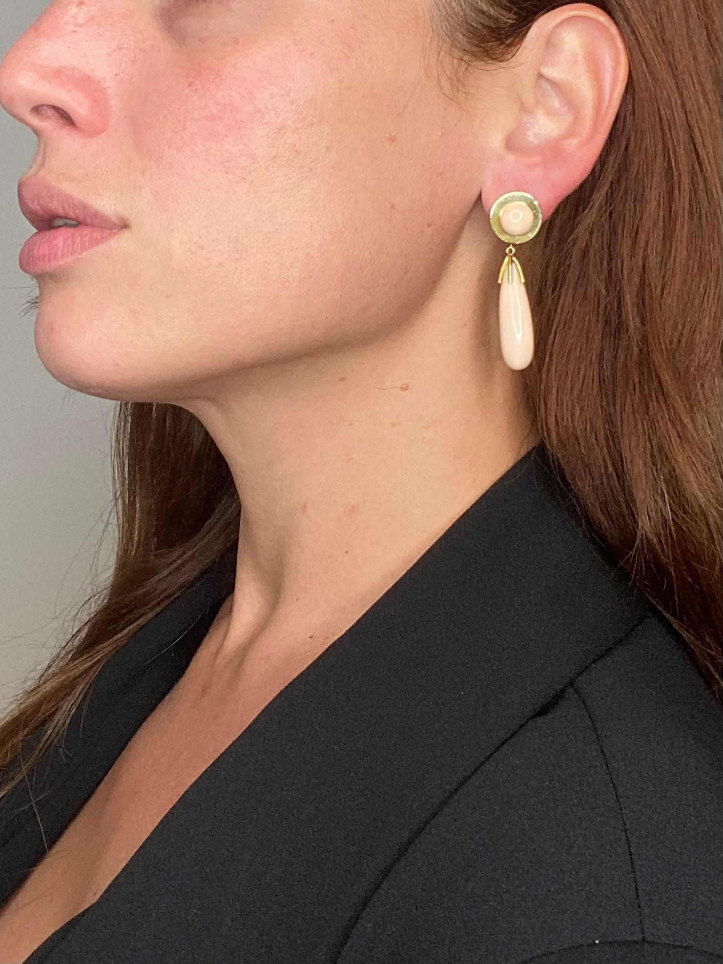 Classic pair of long earrings designed by Cellino.

Designed and made in Italy during the mid century period, circa 1960's. This pair of drop earrings was crafted in solid 18 kt yellow gold and suited with posts (removable) for pierced ears and