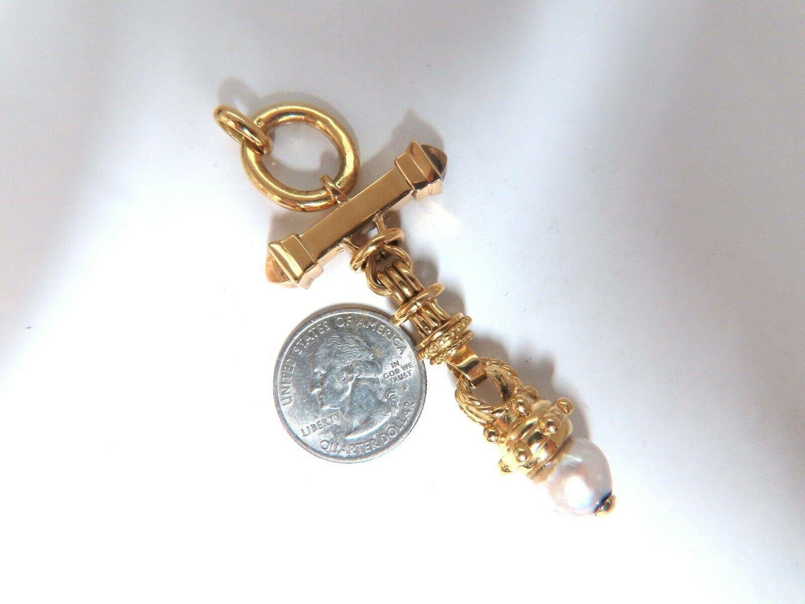 Celtic Dangle Goth Cross Necklace 

10.3mm Pearl

14kt. yellow gold.

3 x 1.3 inch

27.2 grams.
