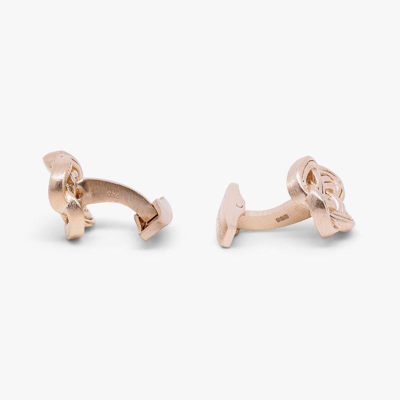 Celtic Knot Cufflinks in Rose Gold Plated Sterling Silver

Intricately woven, 2 micron rose gold plated sterling silver channels overlap, to form a classic, antique-finished Celtic knot. The continuous flow of the binding knot represents eternal