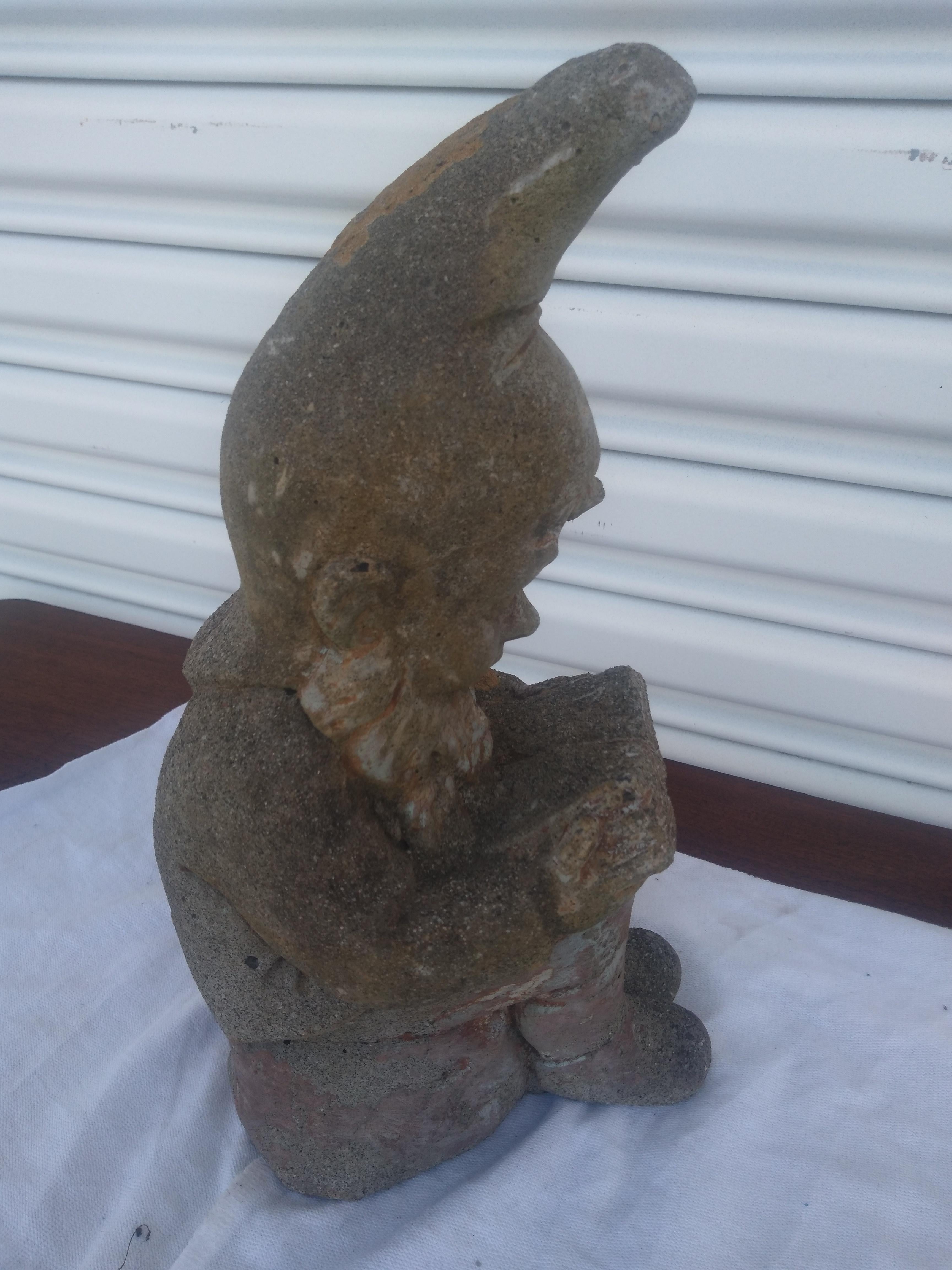 This is a very nicely cast Gnome. The Gnome is captured reading in private. This statue has a lot of detail and the patination is beautiful.