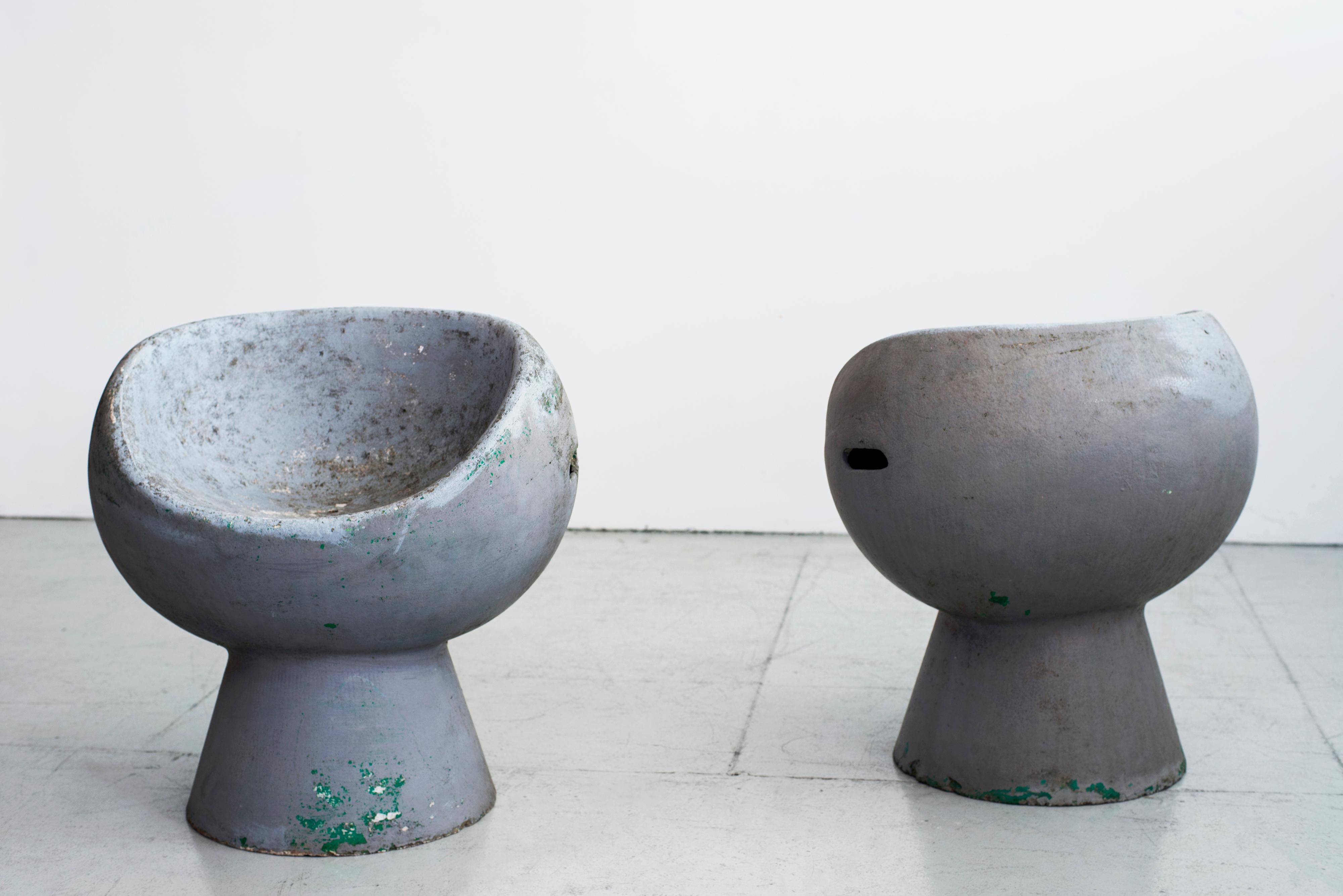 Rare set of two cement pod chairs by Willy Guhl. 
Great sculptural form with wonderful wear and patina to original paint. 
 