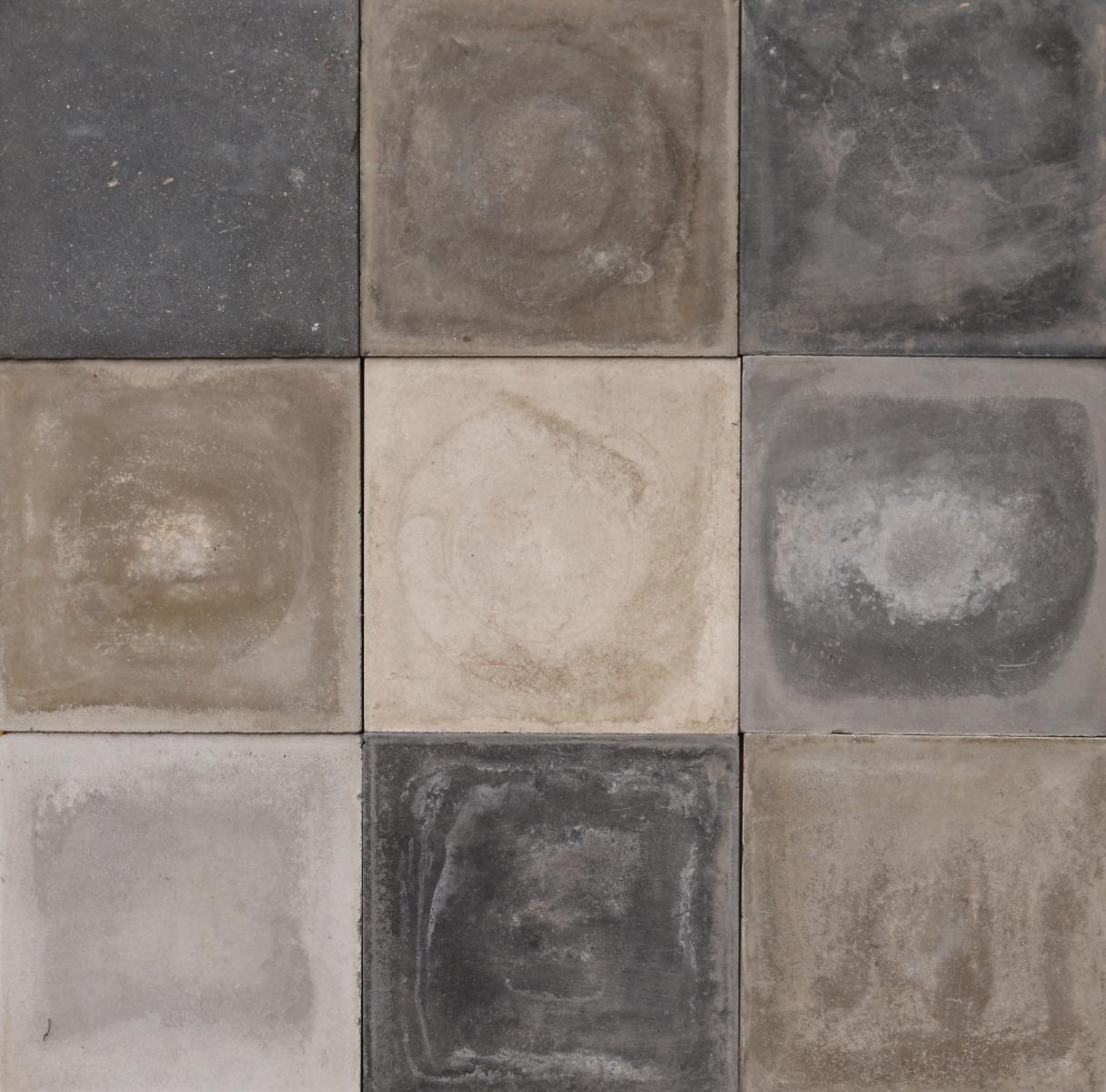 A batch of 351 reclaimed encaustic cement floor tiles. These tiles will cover 14m2 or 151 sq ft. They are suitable for use on floors or walls.

Mixed shades of grey, including olive and dark creams.

Weathered surfaces and small chips associated