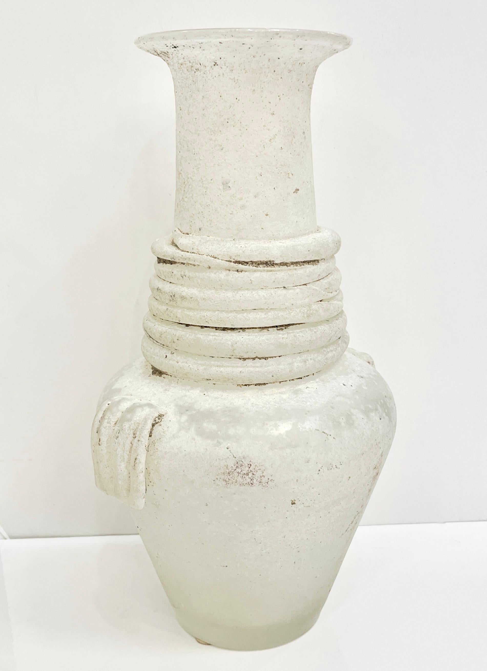 1950s Italian Vintage white scavo Murano glass urn-shaped vase, with Art Deco design the quality of the work is exceptional and speaks Cenedese, a furnace specialized at that time in the technique SCAVO: a special finish to give the idea of an