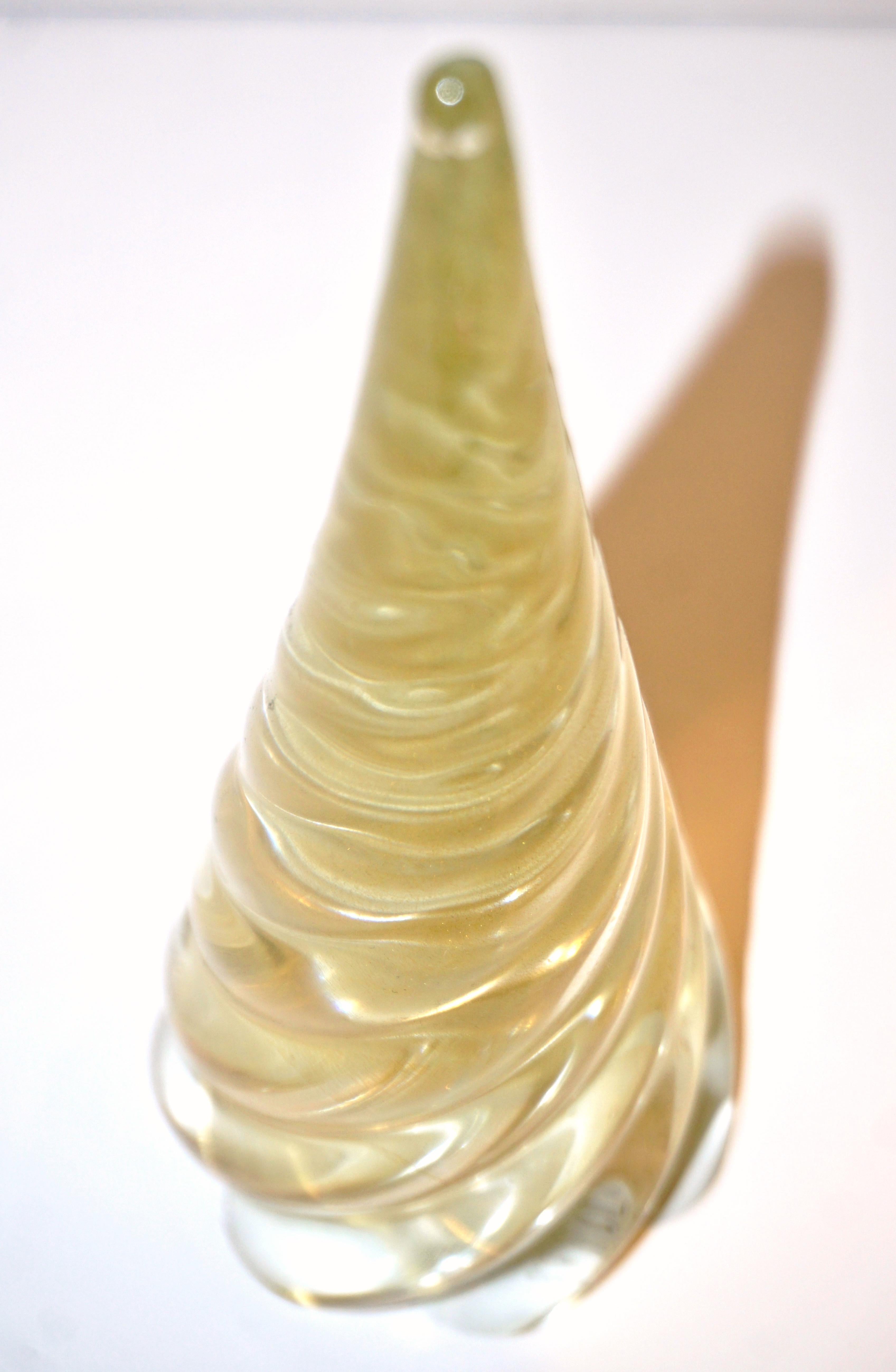 Italian crystal glass tree ornament of organic sleek modern design, a vintage creation part of a collection assembled signed by Cenedese. Individually mouth-blown and handcrafted. Made precious by the use of extensive pure 24-karat gold incased in