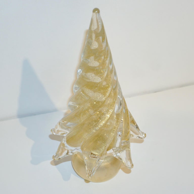 Italian crystal glass tree ornament of organic sleek modern design, a vintage creation part of a collection assembled by Cosulich Interiors & Antiques signed by Cenedese, individually mouth-blown and handcrafted. This design is decorated with a