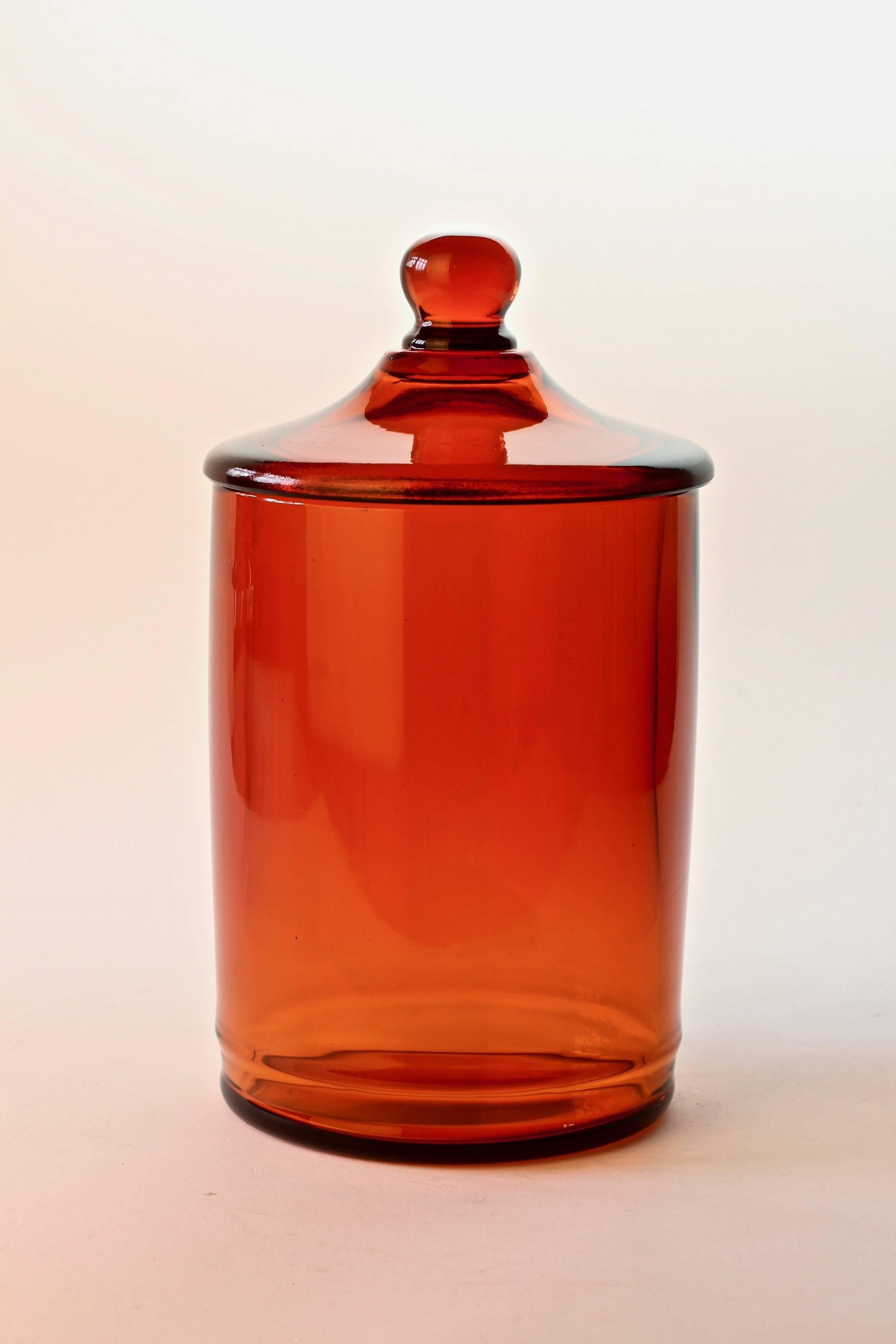 Cenedese (attributed) Murano amber colored / coloured glass Apothecary jar or urn with lid. Wonderful Italian glass and perfect for storage in the kitchen or bathroom. Similar in style to the original designs of apothecary jars from the 19th and
