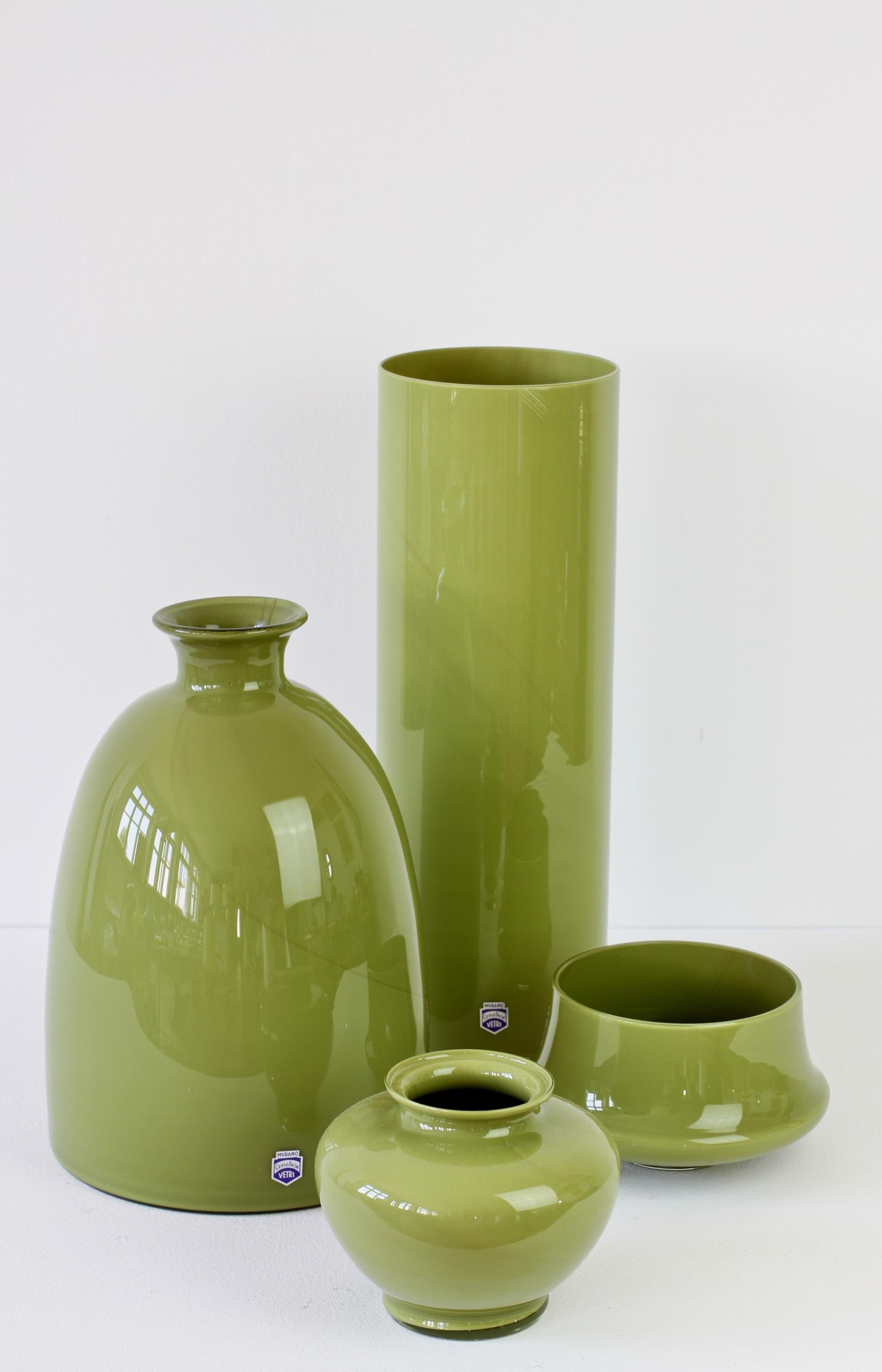 Apple or moss green Cenedese set, group, ensemble or collection of vintage Italian midcentury Murano glass vases, bowls or vessels, made in Italy, circa 1970-1990. Particularly striking are the forms and large size, they have all the characteristics