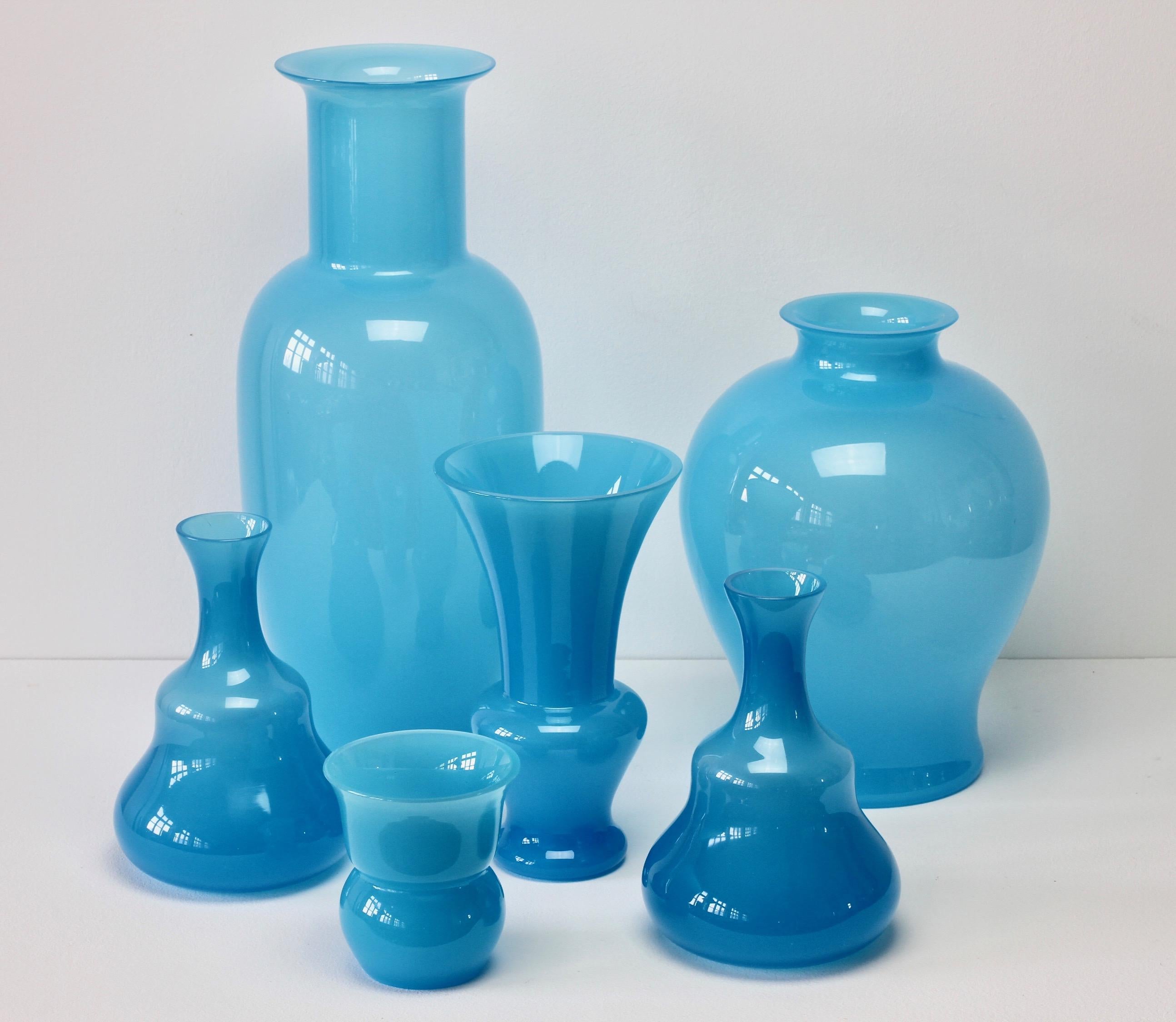 Cenedese set, group, ensemble or collection of vintage midcentury Murano glass vases or vessels, made in Italy, circa 1970-1990. Particularly striking is the light opaline blue colour / color as well as the forms and large sizes, they have all the