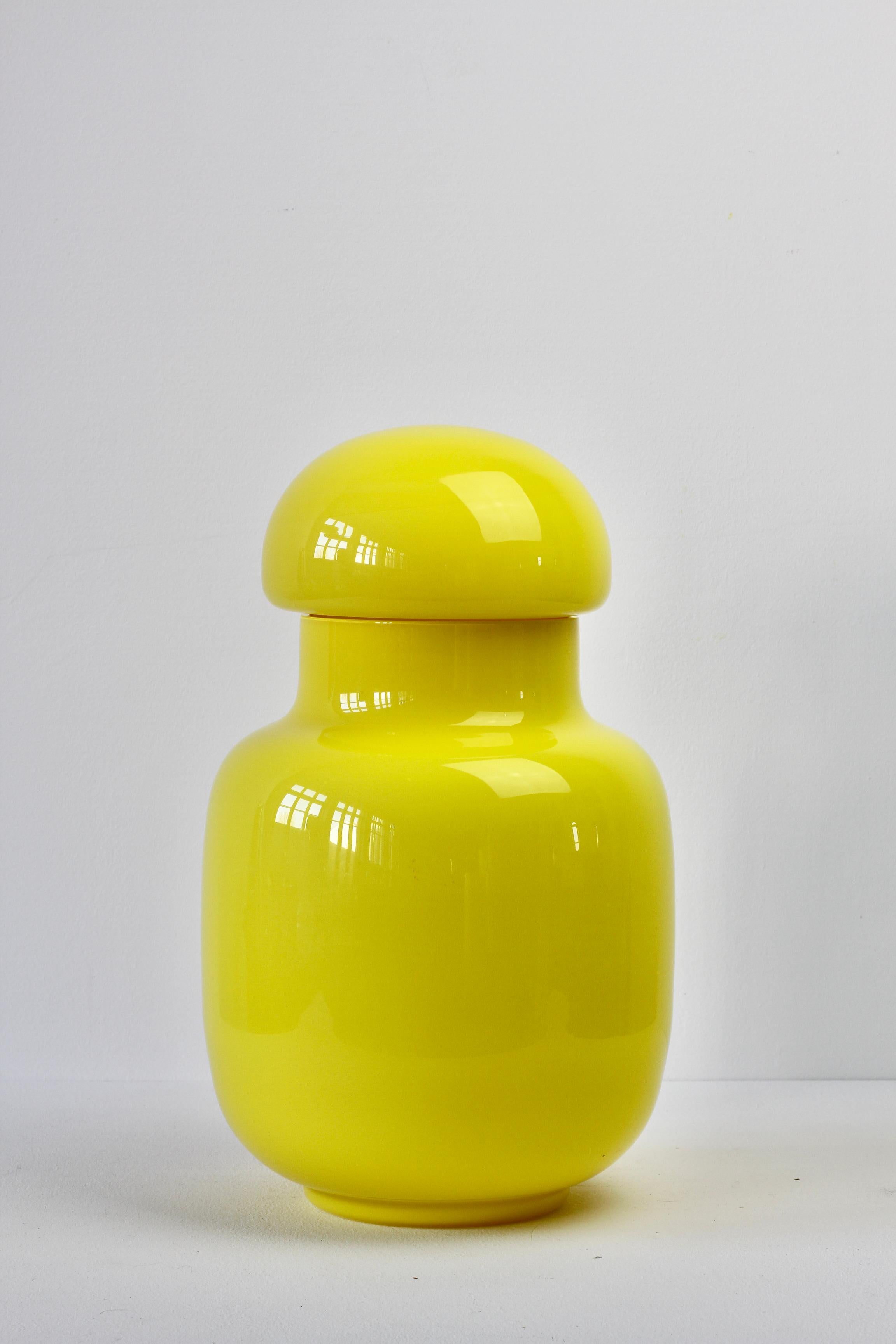 Cenedese large, tall and rare bright yellow vintage midcentury Murano lidded glass jar, vase or vessel, made in Venice, Italy, circa 1970-1990. Particularly striking is the form and large size, this vessel has all the characteristics of hand thrown