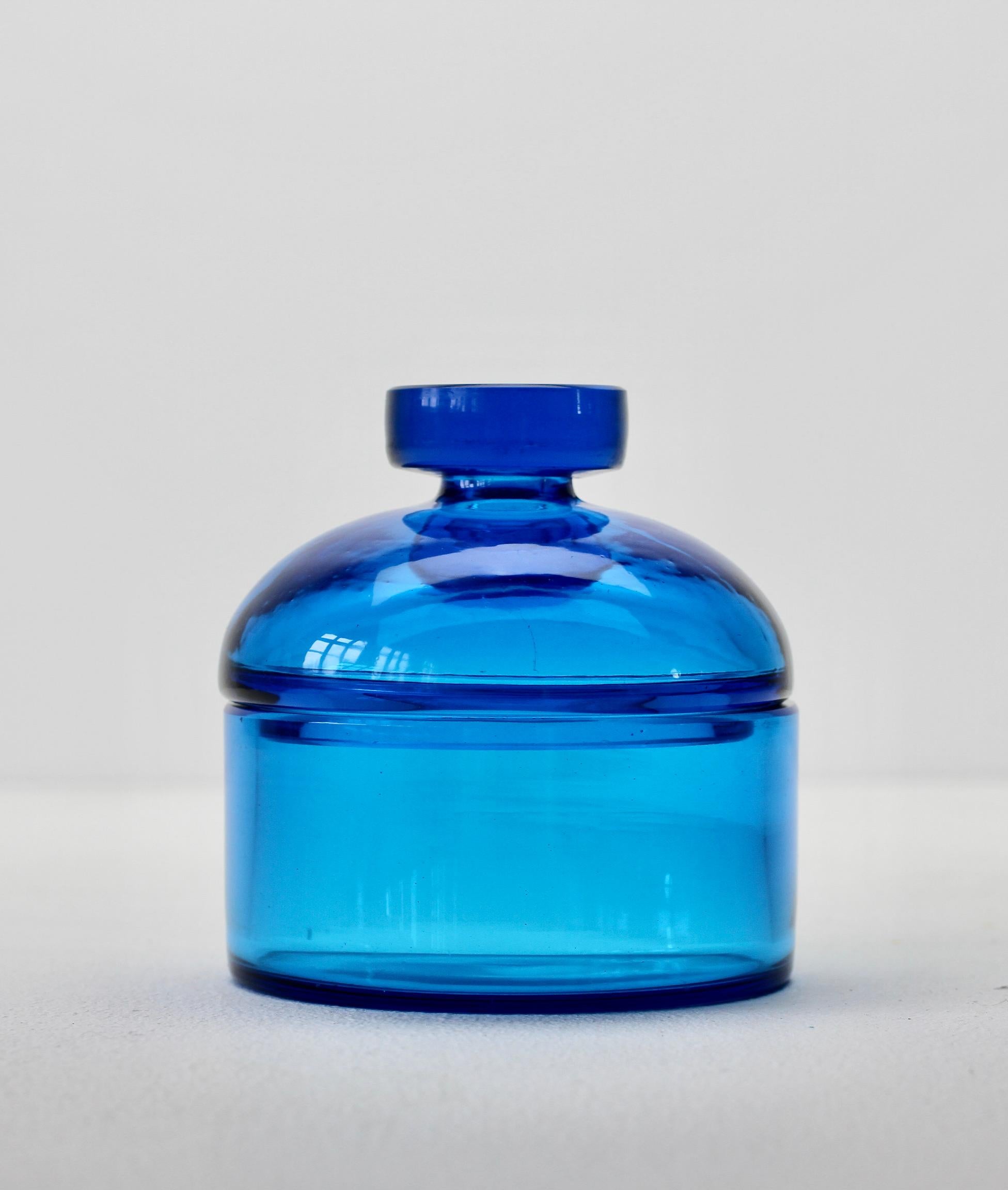 Cenedese vintage midcentury new old stock Murano clear bright blue colored / coloured glass round Apothecary jar or storage container with lid made circa 1970 with original paper label attached. Wonderful Italian glass and perfect for storage in the