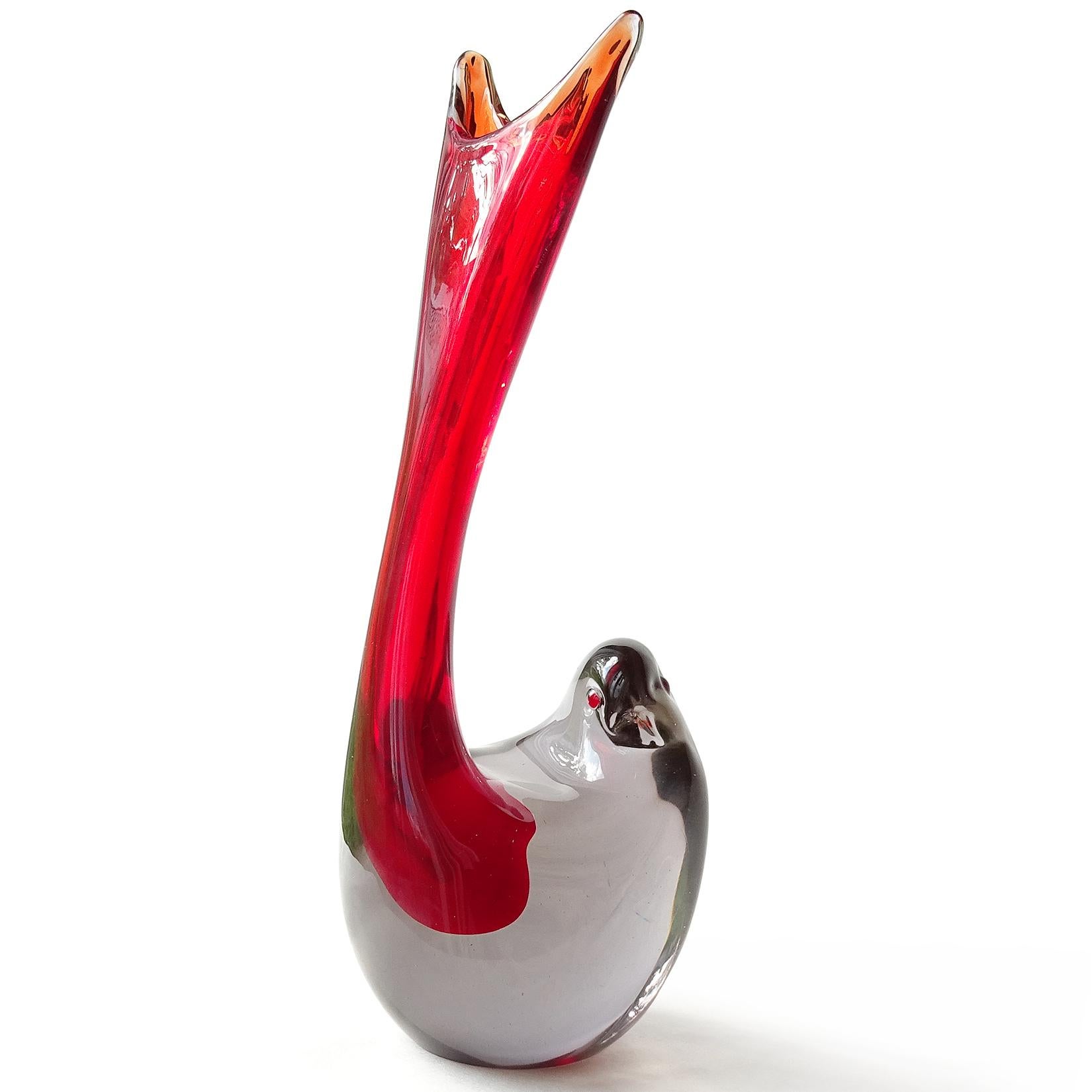 Beautiful and rare, vintage Murano hand blown Sommerso red and Neodymium gray Italian art glass sculptural bird flower vase. Documented to designer Antonio da Ros, for Vetreria Gino Cenedese, circa 1961. The same vase is published (in yellow and