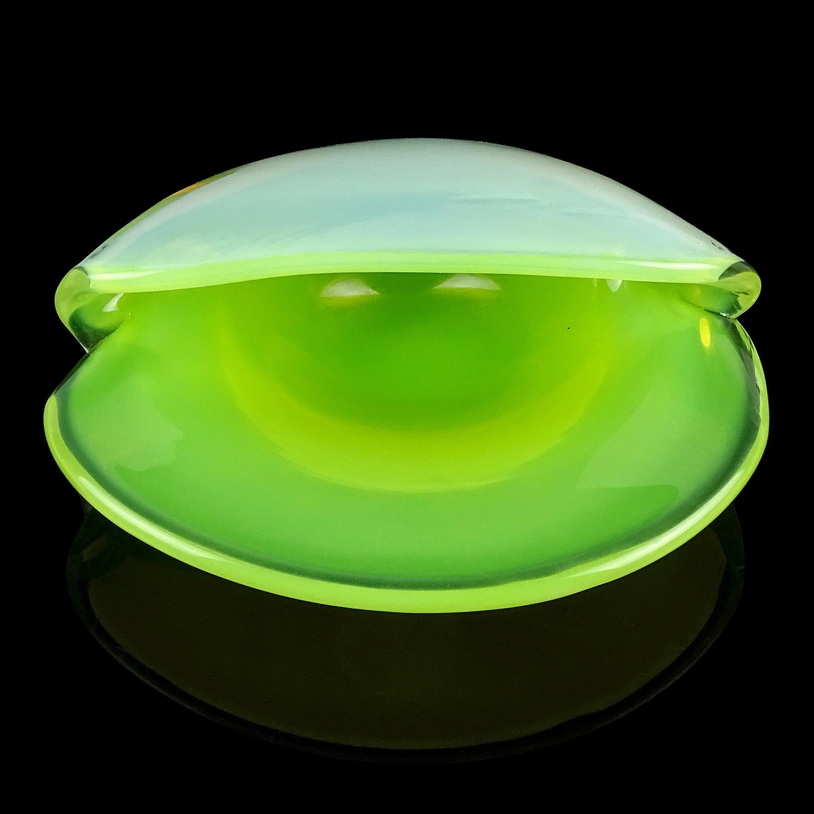 Beautiful vintage Murano hand blown opalescent white and yellow green Italian art glass clam shell decorative bowl. Documented to the Cenedese Company. Would make a great display piece on any vanity or desk. The seashell could be used as a catchall,