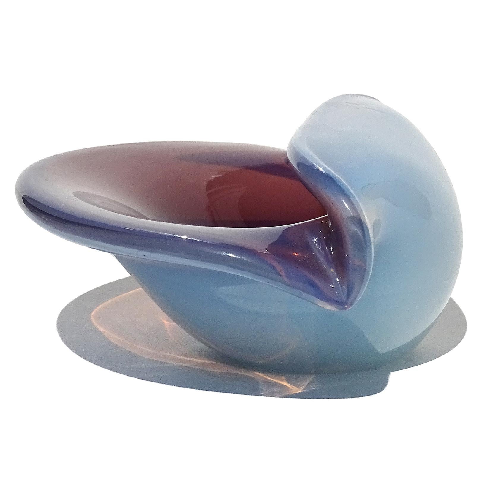 Beautiful vintage Murano hand blown opalescent white and purple Italian art glass clam shell decorative bowl. Documented to the Cenedese Company. Would make a great display piece on any vanity or desk. The seashell could be used as a catchall,