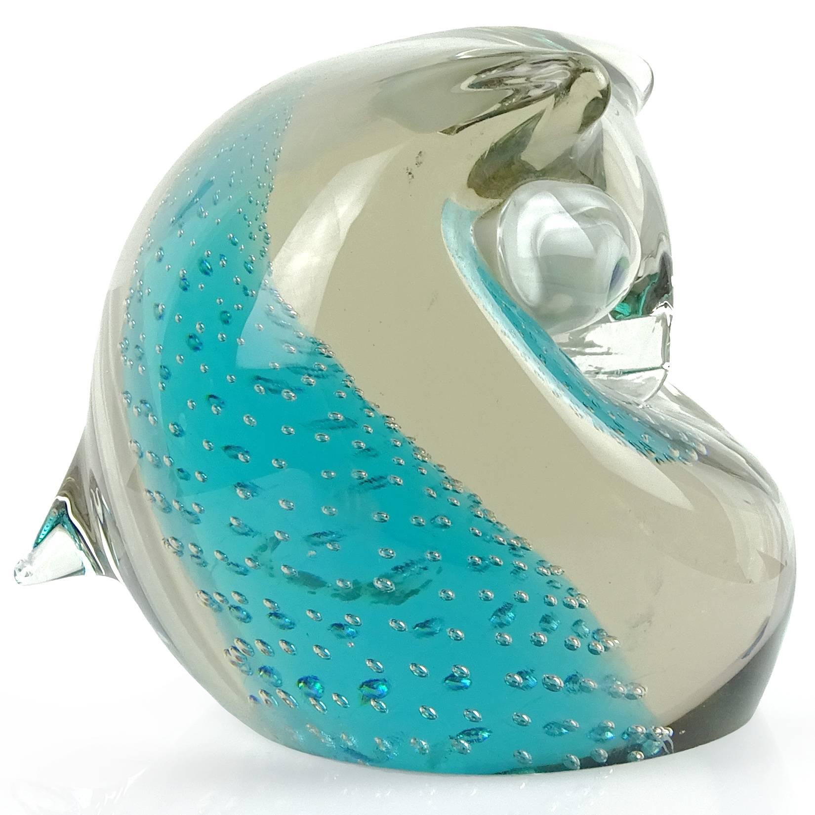 Cute and chubby vintage Murano hand blown Sommerso blue core with bubbles Italian art glass owl bird sculpture. Documented to the Cenedese company. The bird is very thick and heavy, with large eye murrines. Measures: 4 3/4