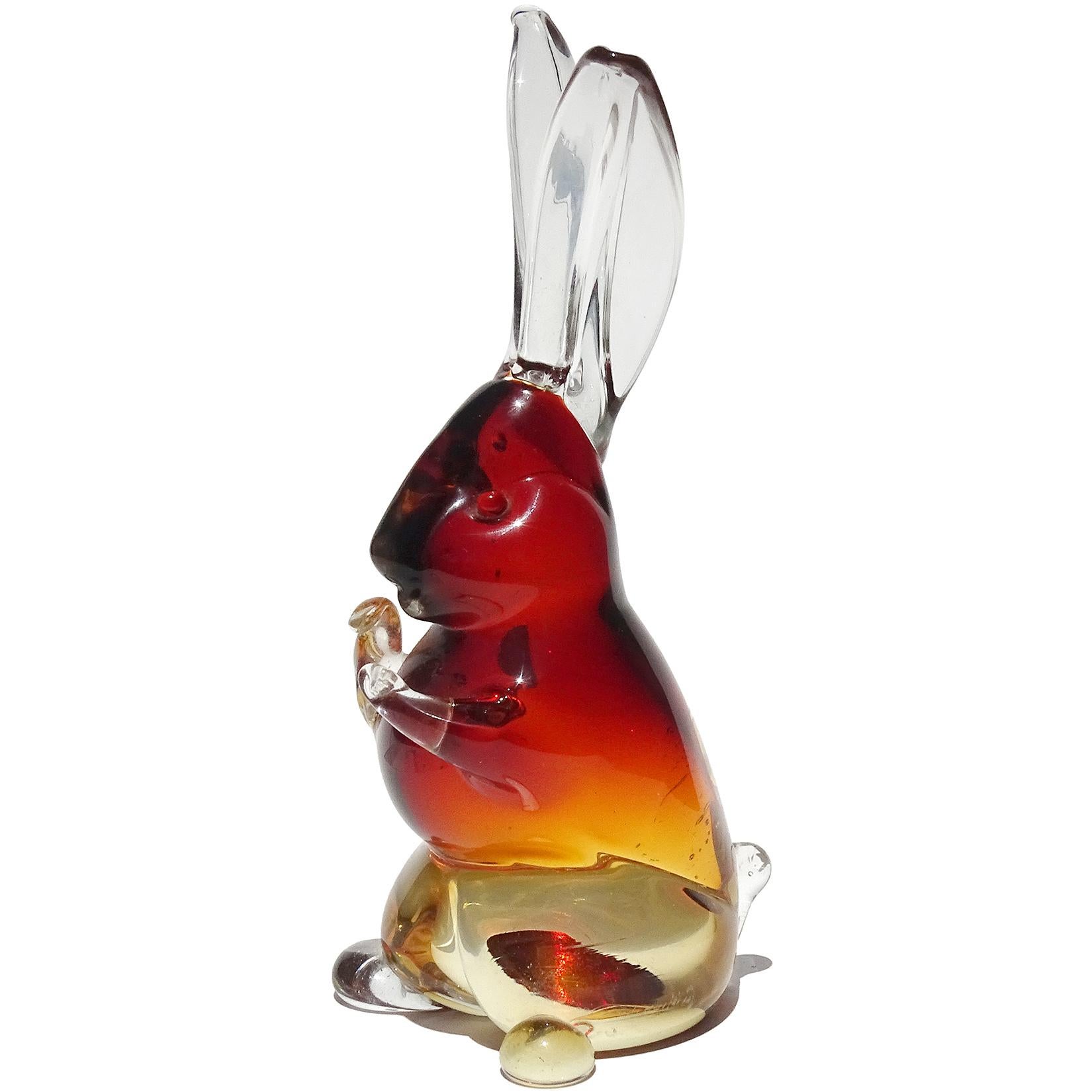 Beautiful and very cute Murano hand blown Sommerso red, orange to clear Italian art glass bunny rabbit sculpture / figurine. Documented to the Cenedese company. Would make a great display piece on any desk, curio cabinet or coffee table. Mid-century