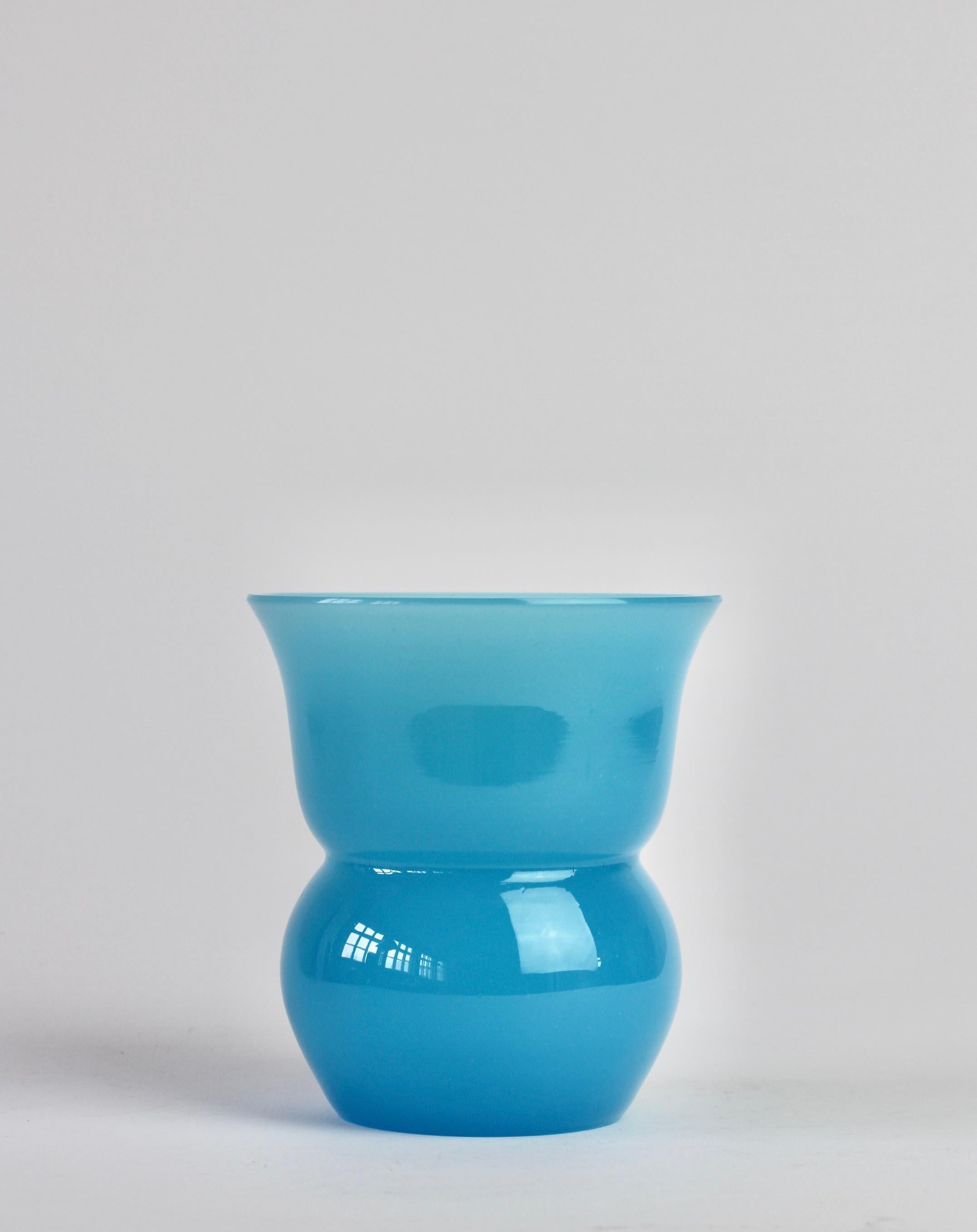 Vintage midcentury petite vase by Cenedese Vetri of Murano, Italy. Elegant form and striking light opaline blue color/colour. 

Dimensions are: 12.1cm tall, 10.8cm at widest point.

 