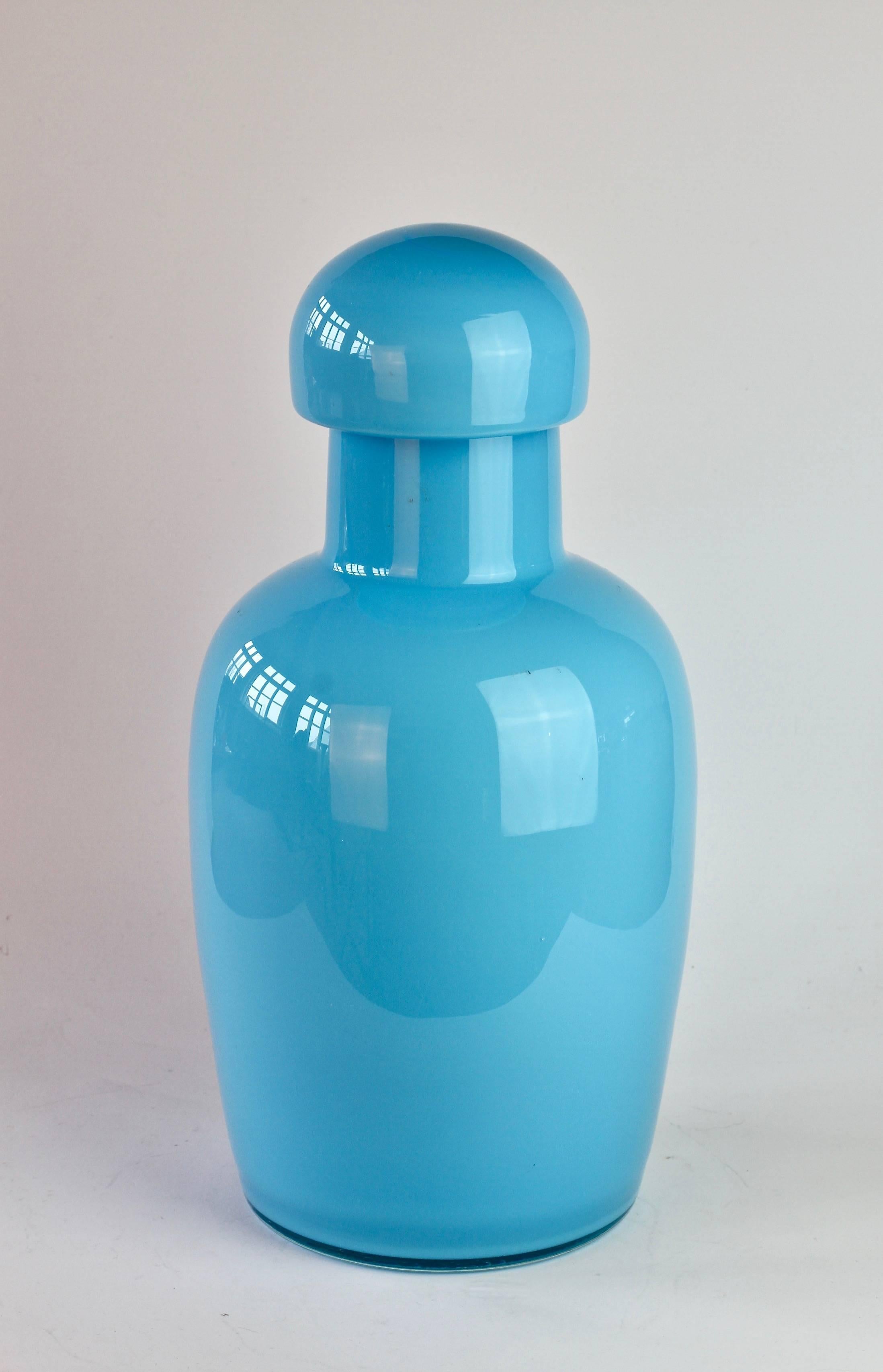 Wonderful tall light blue urn by Cenedese Vetri of Murano, Italy. A fun, funky and bright way to add a touch of bold colour / color to your interior - imagine glass like this on open, white shelving in a kitchen, bathroom or in a display