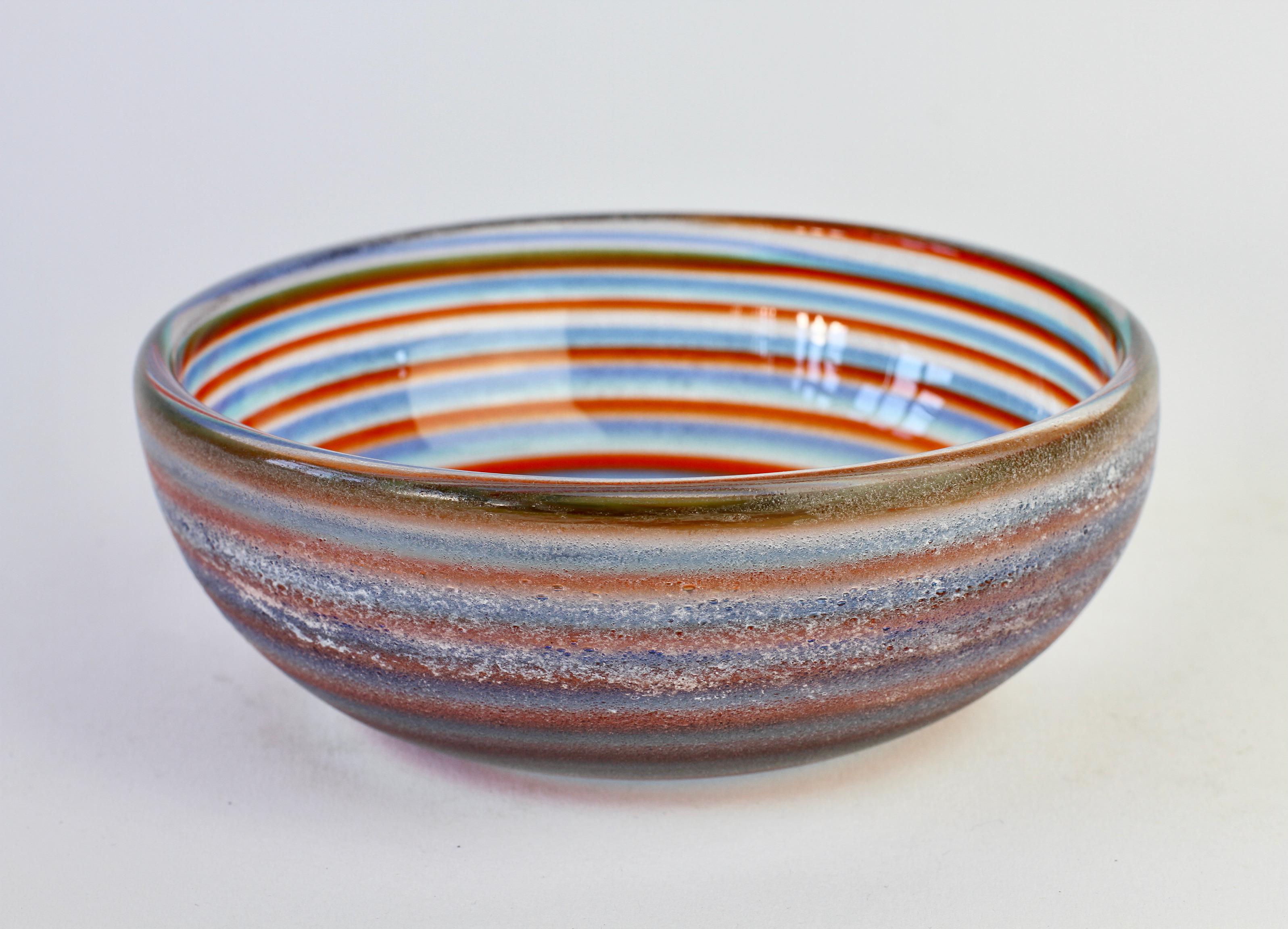 Vintage midcentury Murano 'Corroso' glass serving bowl, dish or ashtray by Cenedese, circa 1970-1990 (design is attributed to Fulvio Bianconi but we do not have any documentation for this). Wonderful clear glass with a colorful spiral inclusions of