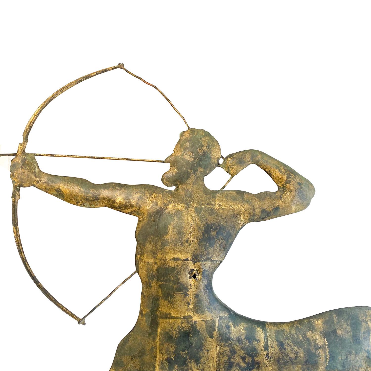 Swell body molded copper weathervane with sheet copper tail, the bow and arrow are thick metal wire.. Great weathered surface with paint and gilding with areas of verdigris, few bullet holes. Attributed to A.L. Jewell & Company, Waltham, Ma, late