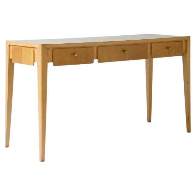 Table console centrale en érable blond dans le style de Gio Ponti.