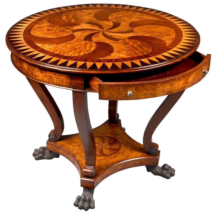 For FULL item description click on CONTINUE READING at the bottom of this page.

Center Lamp Occasional Table with Swirling Teardrops from the Essential Collection by Theodore Alexander
A marquetry inlaid lamp table with swirling teardrop inlays