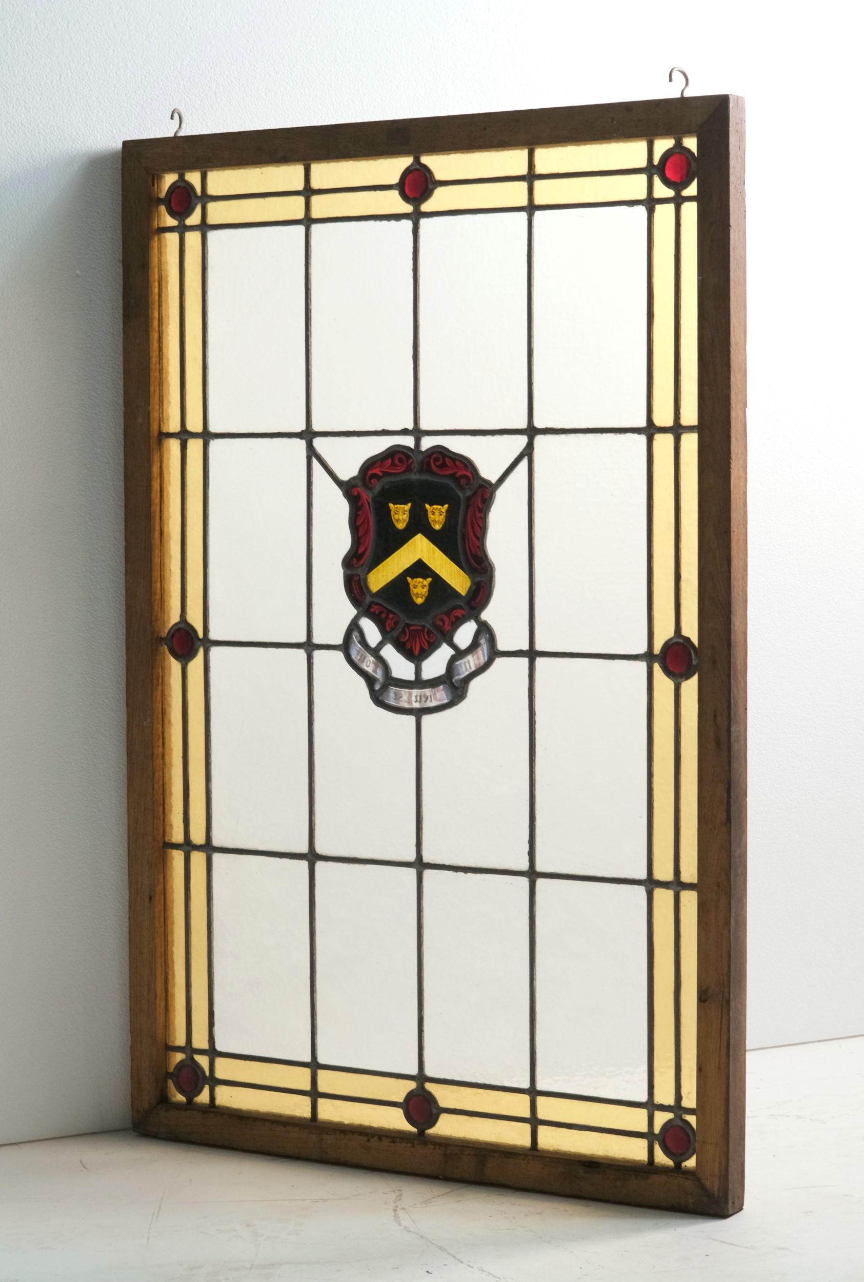 20th Century Center Lion Head Crest Stained Glass Window with Red Jewels and Yellow Border