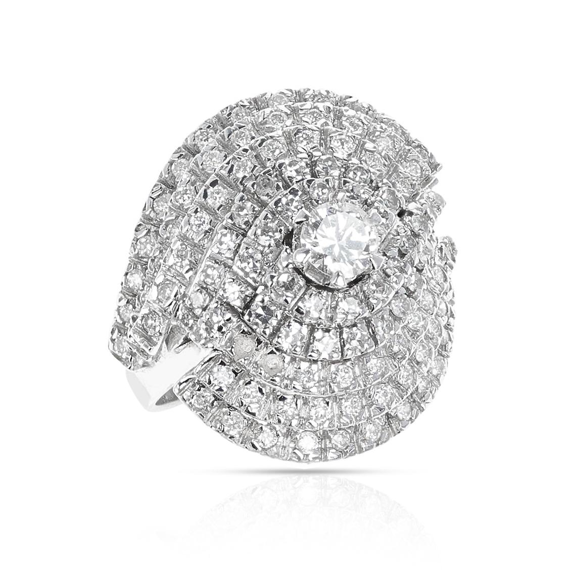 A Center Round Diamond with Diamond Layered Cocktail Ring made in 18 Karat White Gold. The ring size is US 6.25. 