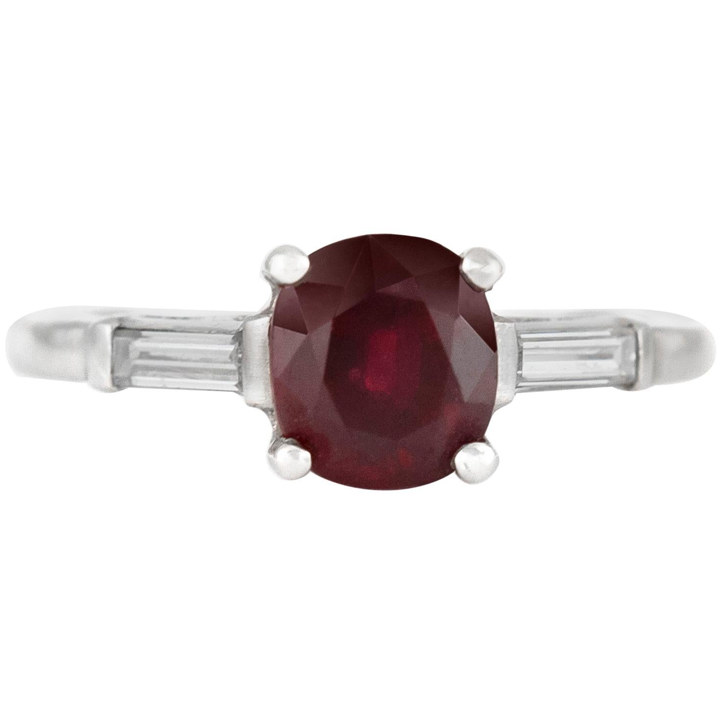 Center Ruby Engagement Ring with Two Baguette on the Side For Sale