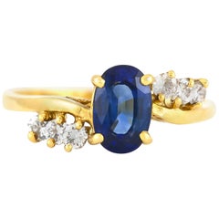 Center Sapphire with Six Diamonds Ring