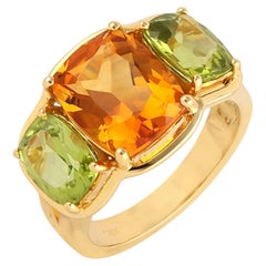 Bague en or jaune 18k avec citrine en pierre centrale et 2 péridots en pierre de taille