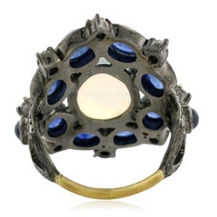 Center Stone Opal Ring Surrounded by Blue Sapphires & Diamonds Made in 18k Gold
