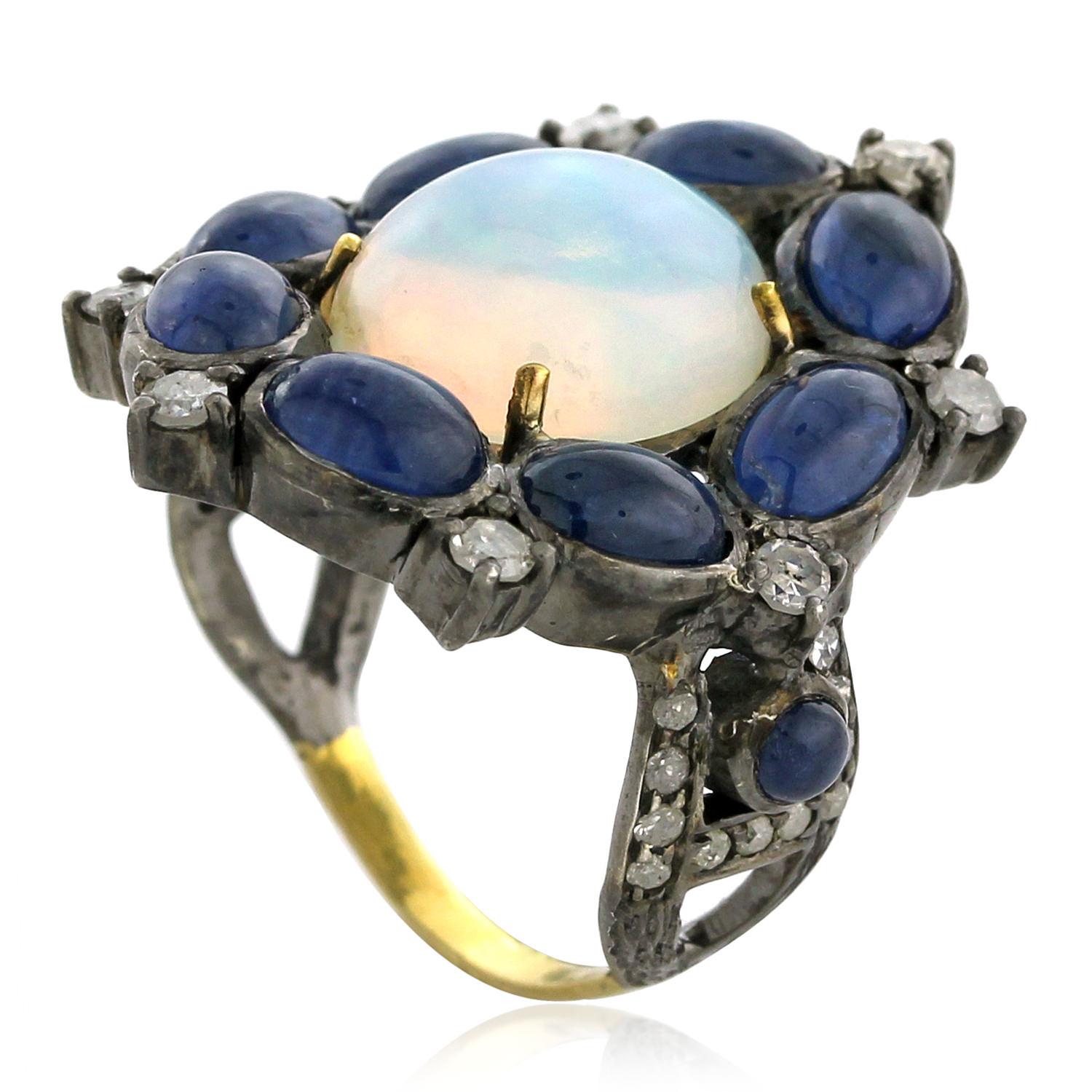 Artisan Center Stone Opal Ring Surrounded by Blue Sapphires & Diamonds Made in 18k Gold For Sale