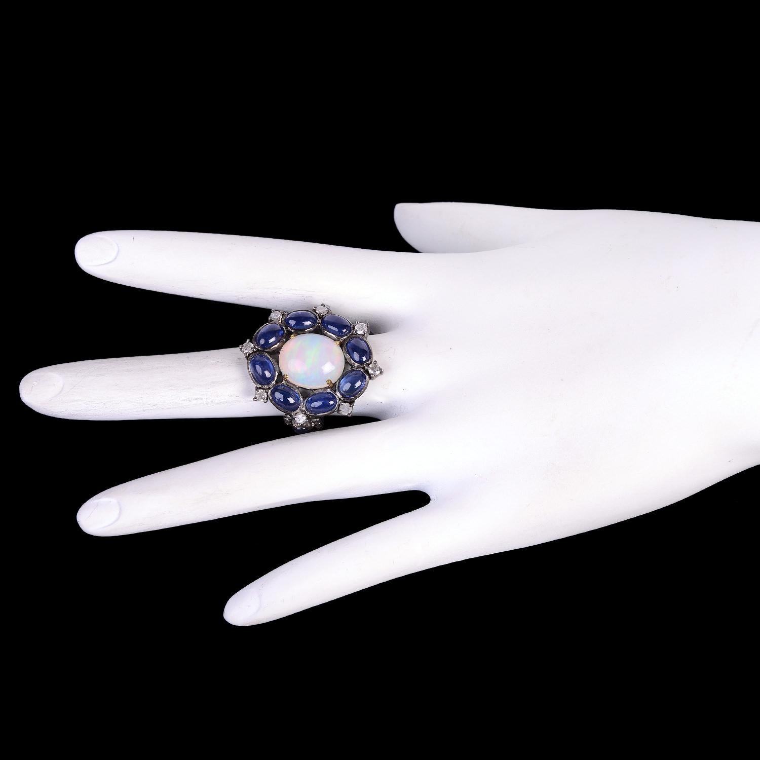 Mixed Cut Center Stone Opal Ring Surrounded by Blue Sapphires & Diamonds Made in 18k Gold For Sale