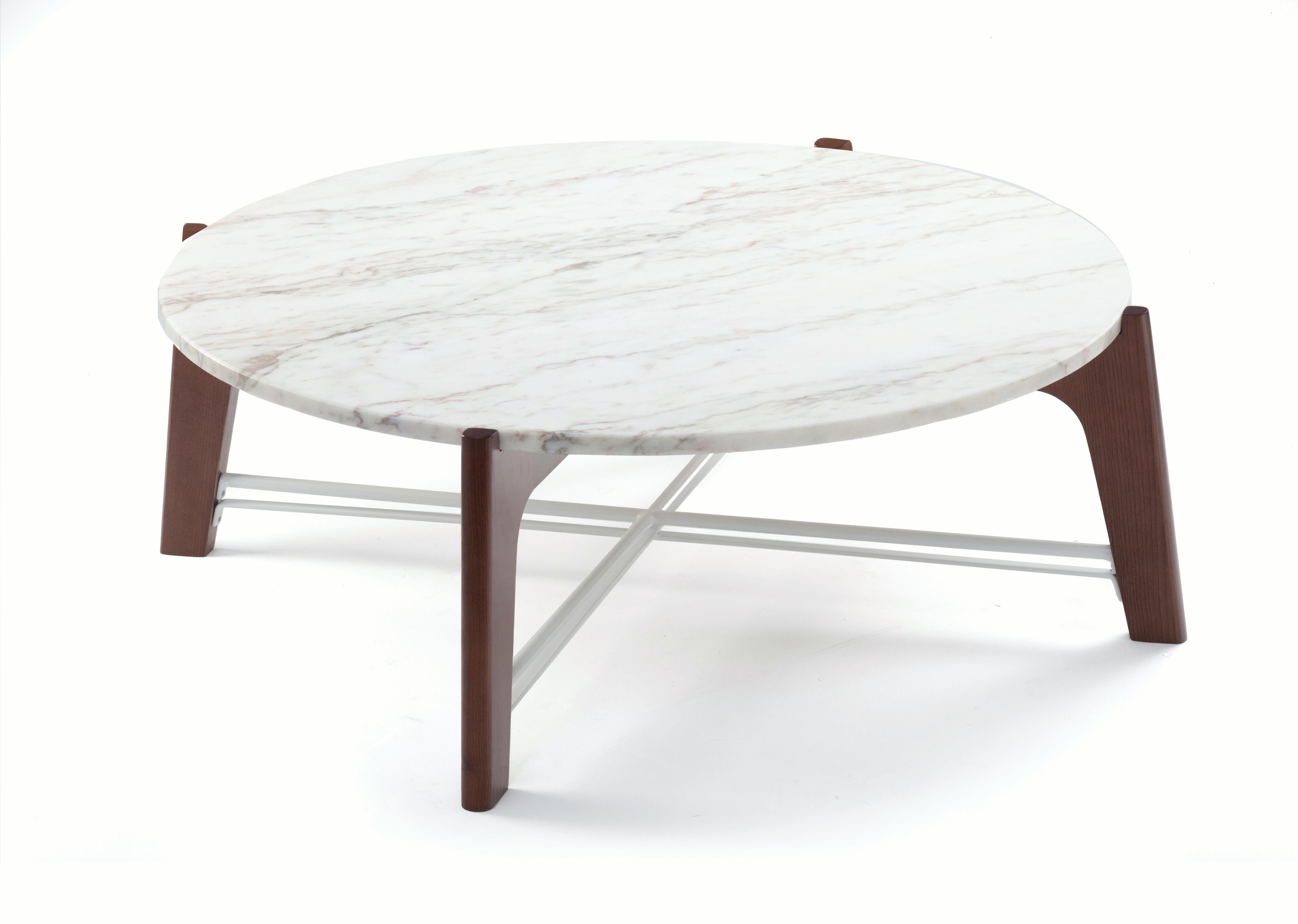 Flex center table has a solid beech wood base shaped elegantly, completed with a lacquered metal structure and receives a table top in Estremoz white marble. Made to Order. 

For sales with delivery address within European territories, VAT will be