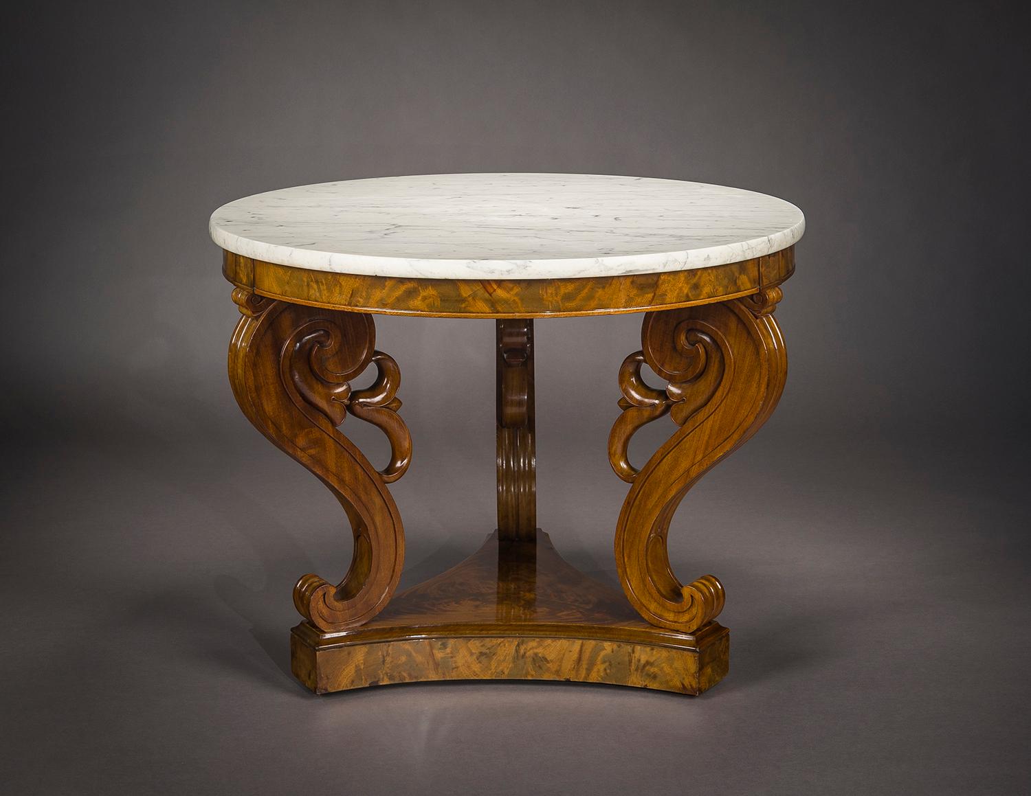 Boston, Massachusetts, circa 1825–1830.
Mahogany, with marble. 
Measures: 30 15/16 in. high x 39 15/16 in. diameter.

This center table is characteristic of Boston production in the period 1825-1830. Reliant upon beautifully figured mahogany