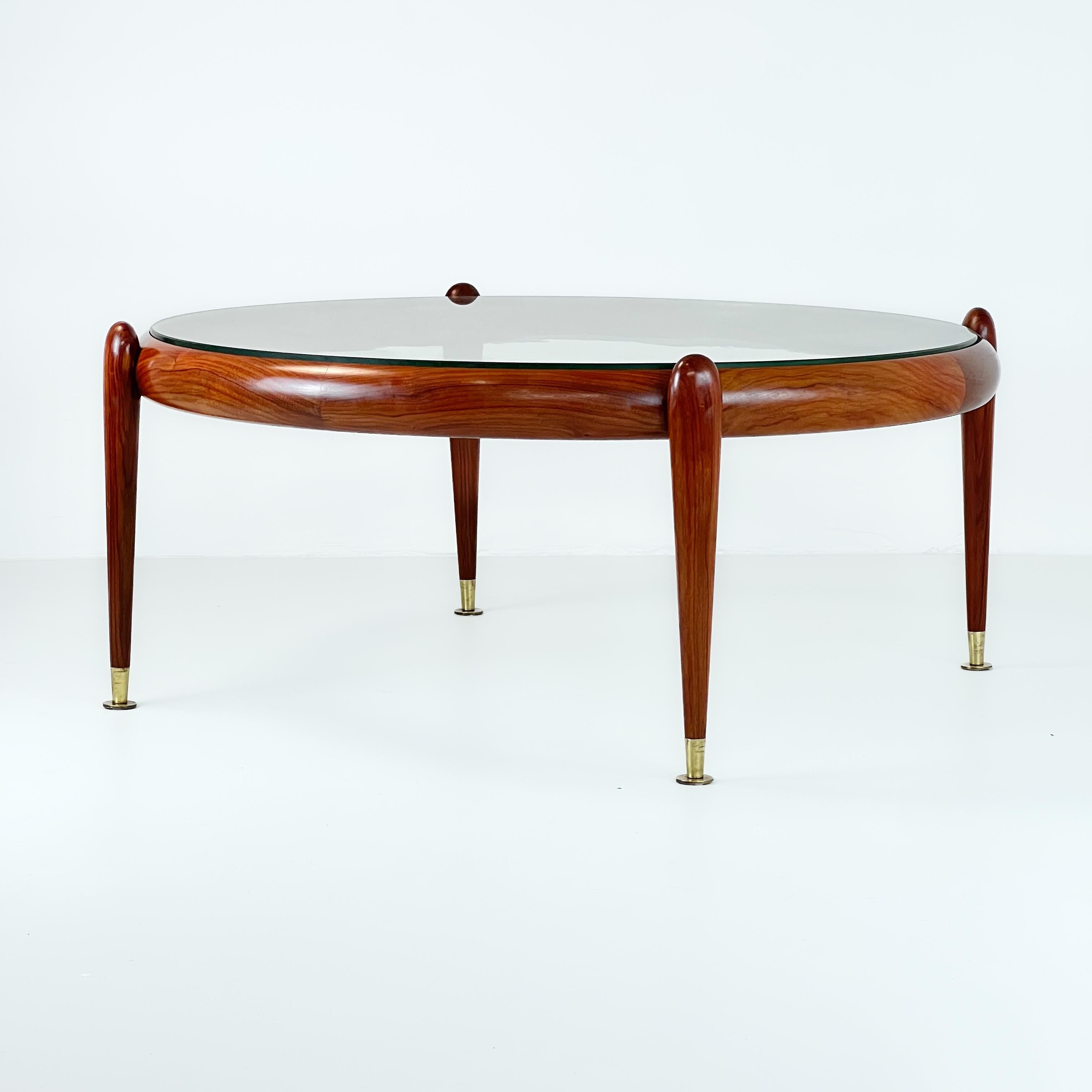 Beautiful center table designed by Giussepe Scapinelli, in caviuna rosewood and brass, Brazil, 1960.

The restoration process only needed refinishing, which was done by our team at the finest details and preserving the originality from that