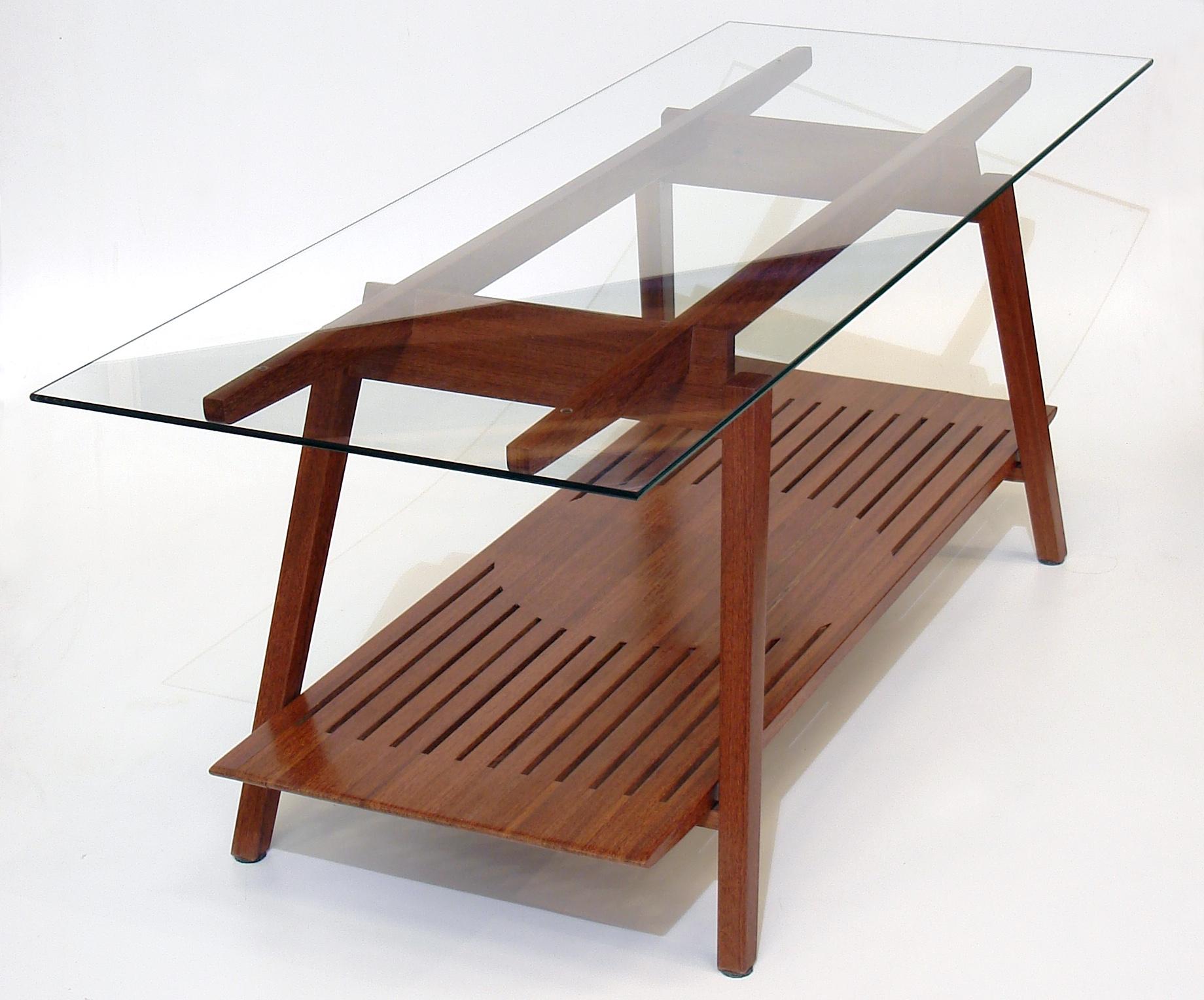 Low table made with selected tropical Brazilian hardwood. Contemporary Brazilian design. 

Assembled with traditional wood joints. Glass tabletop.