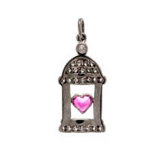 18 K White Gold Diamond pavilion with Heart Ruby in center