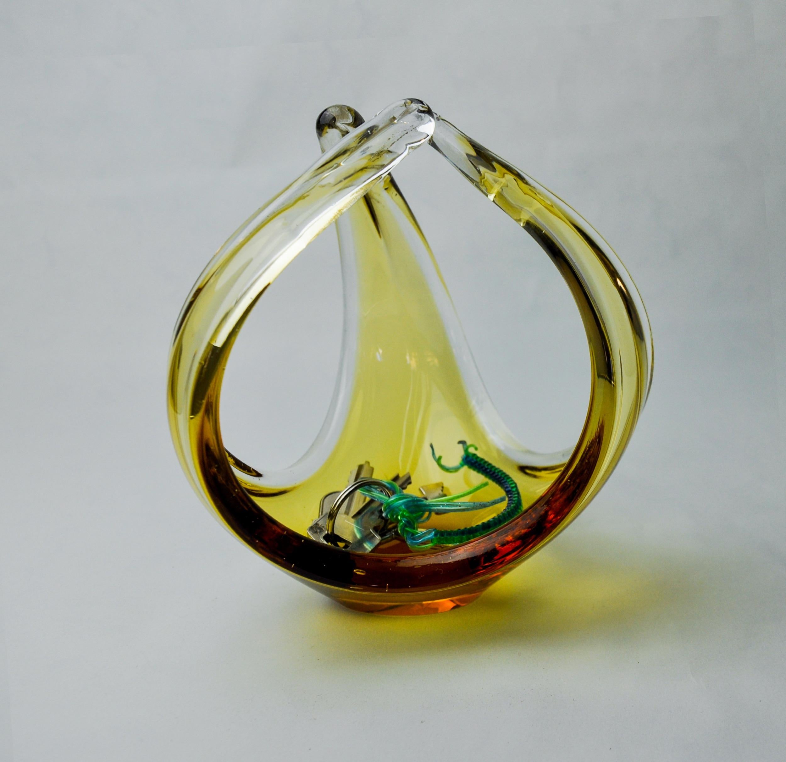 Stunning and rare yellow centerpiece designated and made for murano seguso in the 1970s. Artisanal work of glass according to the 