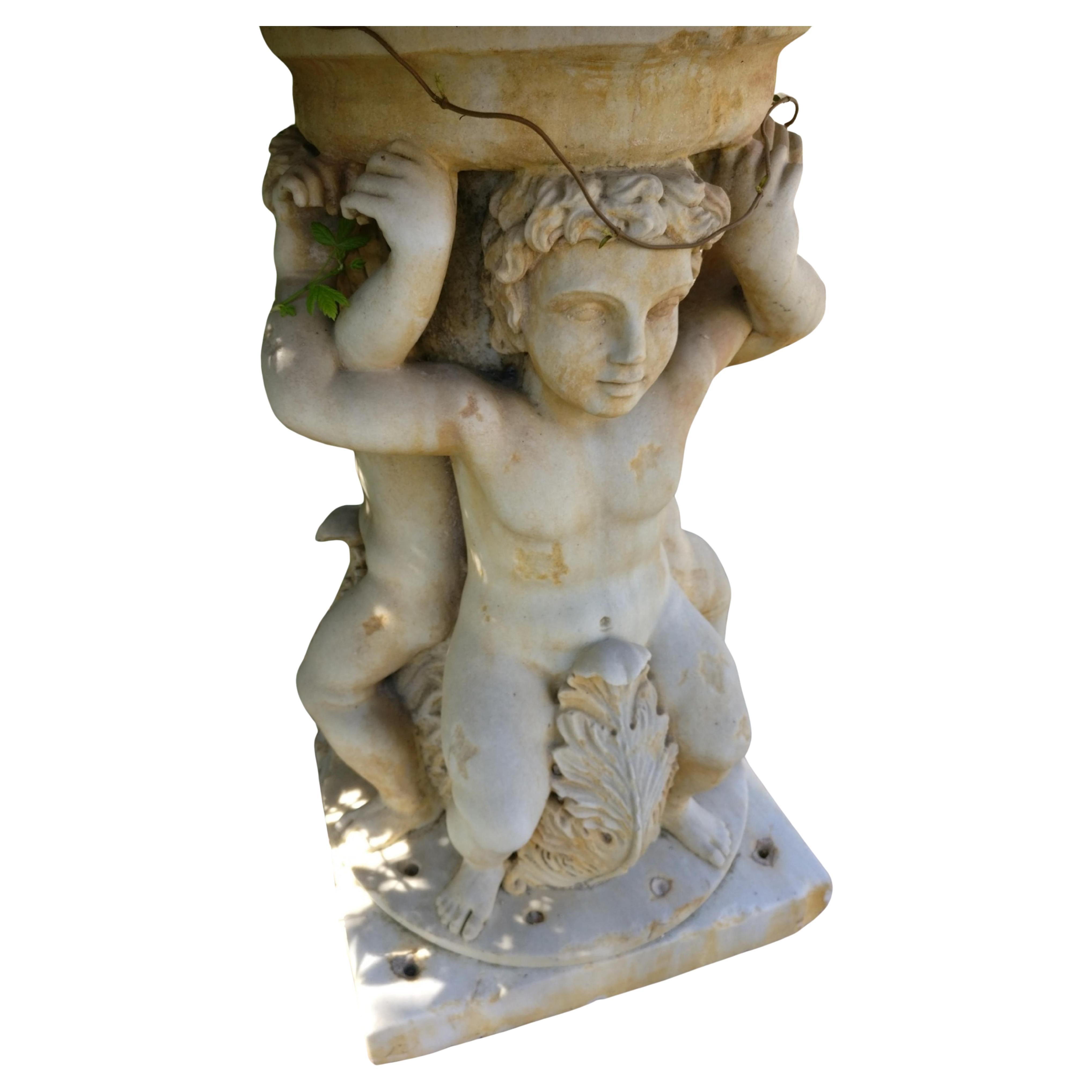 Centerpiece fountain with an octagonal basin in Rosso Verona marble and Greco Thassos marble. 

Water flows from the center of the basin through a hole. 
Dating to the late 17th century and sourced from the garden of a Venetian villa, it is