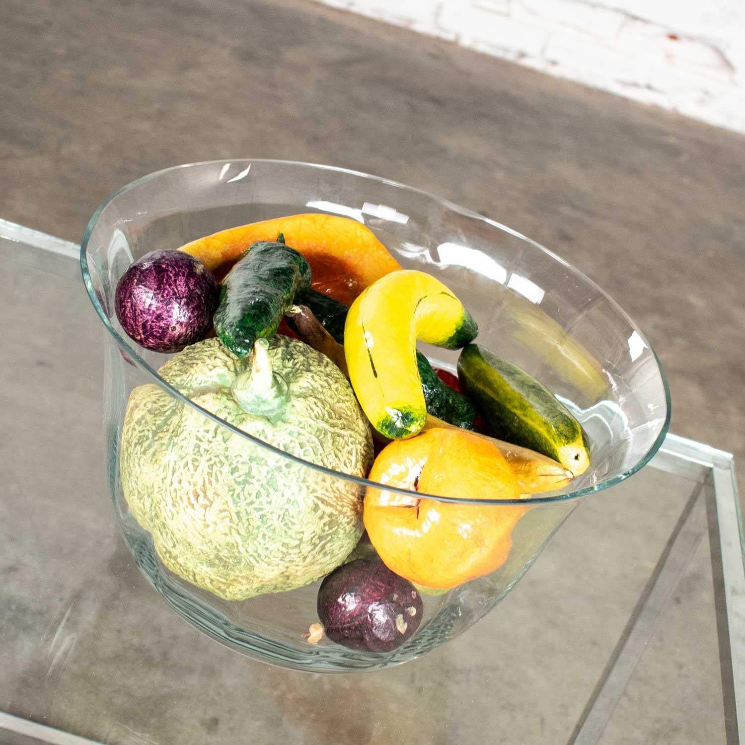 Beautiful centerpiece consisting of large clear glass bowl filled with papier mâché fruit and vegetables plus a ceramic cantaloupe. It is all in wonderful vintage condition with no outstanding flaws we have detected. Please see photos, circa