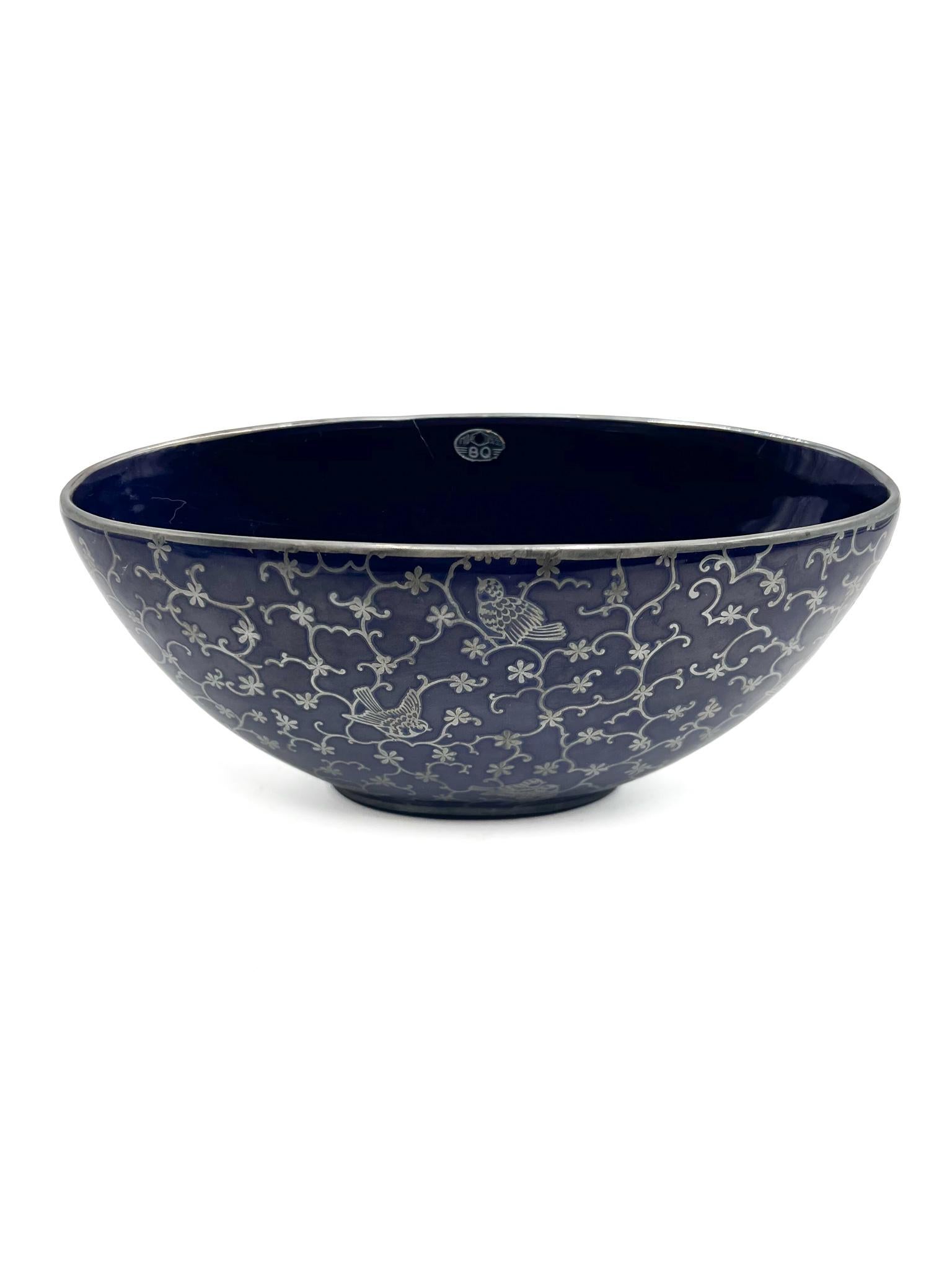 Blue ceramic centerpiece / bowl with silver decorations, made by Richard Ginori in the 1960s

Measures: Ø cm 24 Ø cm 11 h cm 11

Company of Italian origin founded in 1896 when the Marquis Carlo Ginori, passionate about white gold, arrives in