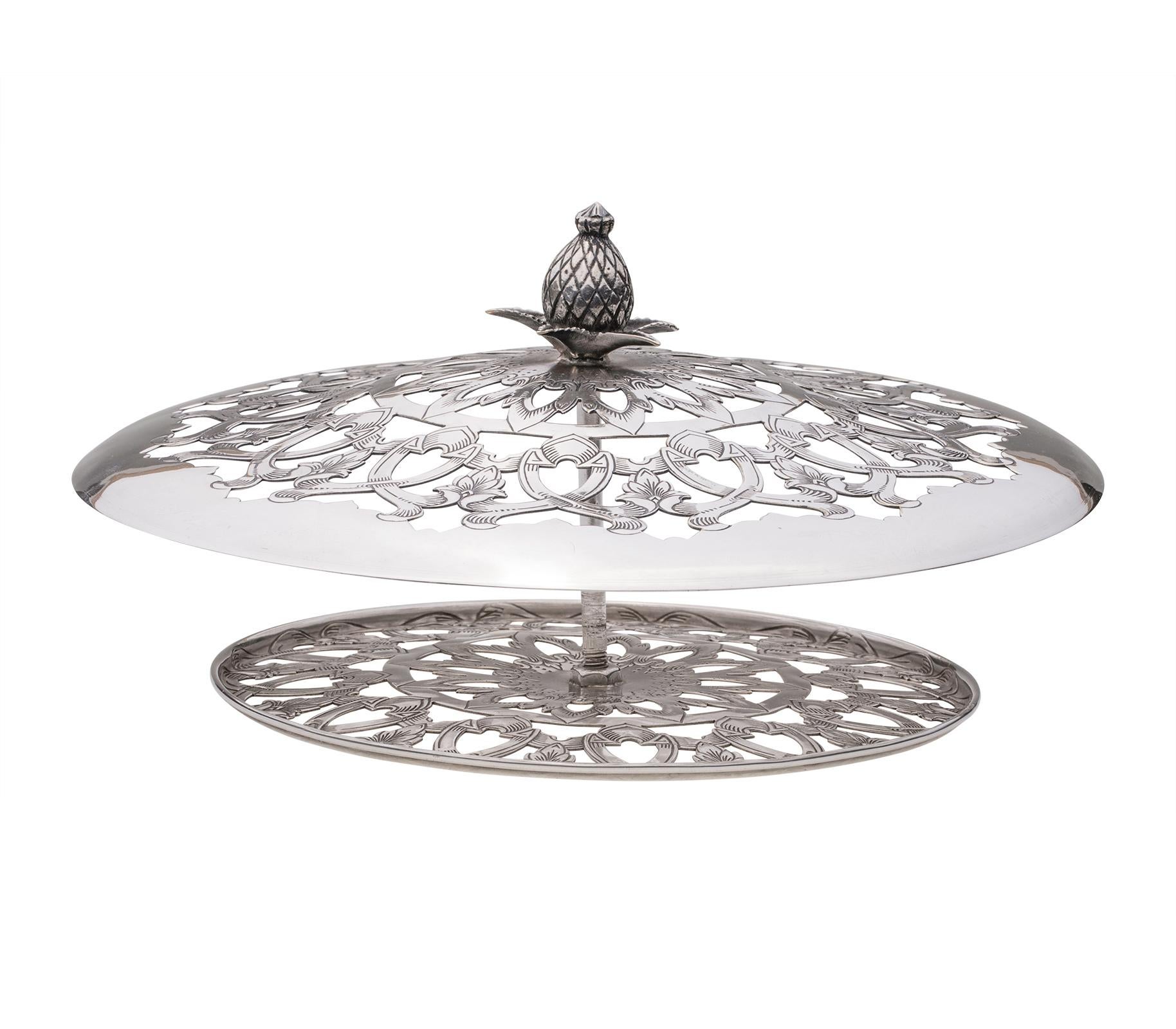 All solid Sterling Silver flower frog bowl by Shreve Treat & Co. double lid is pierced in floral design for placing cut flowers. Pineapple shaped center knob for easy lid removal. A very beautiful and decorative centerpiece for your table.