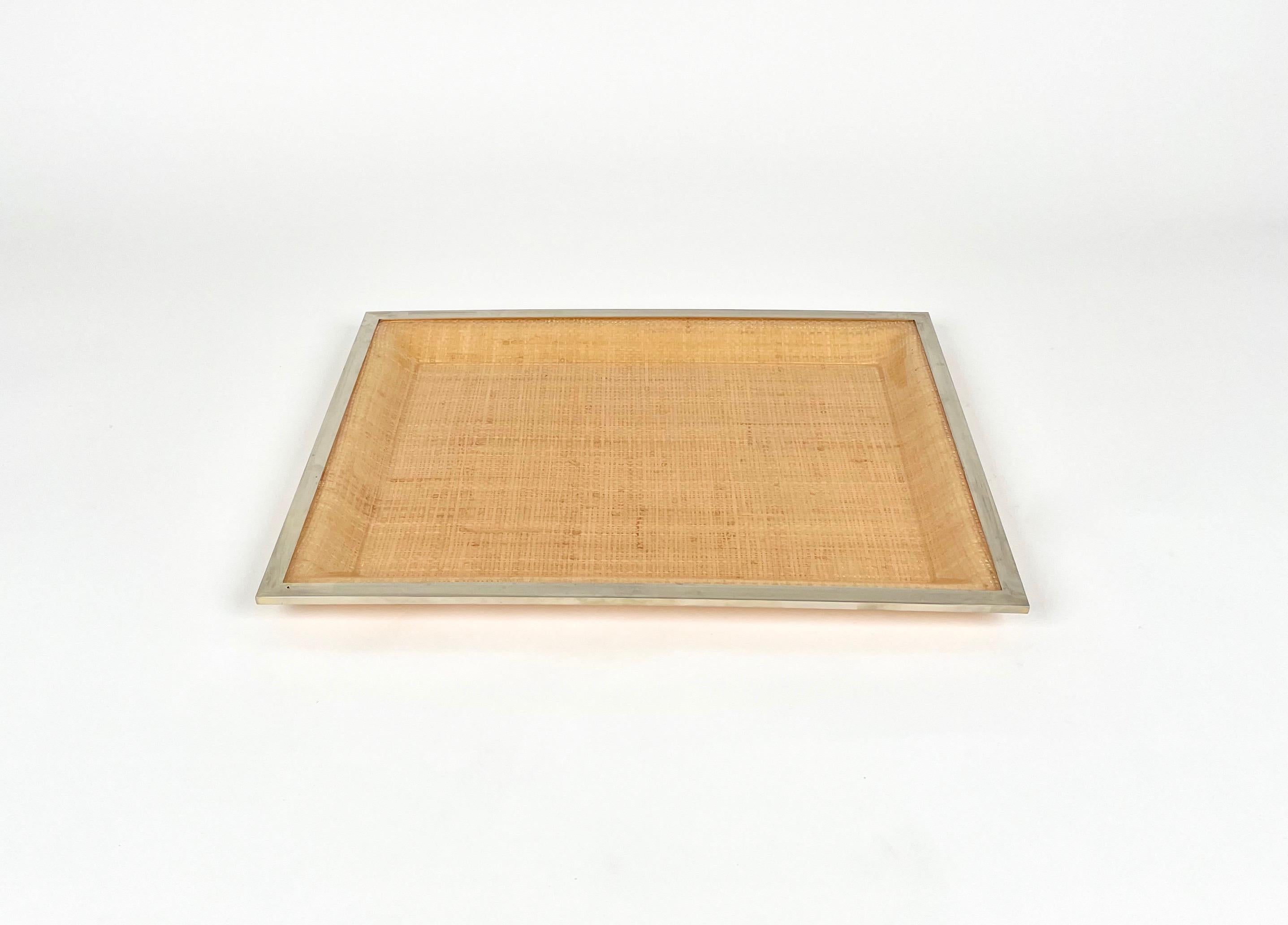 Rectangular serving tray centerpiece in wicker and lucite with chrome borders in the style of Christian Dior. 

Great accessory for any modern interior. 

Made in Italy in the 1970s.
 