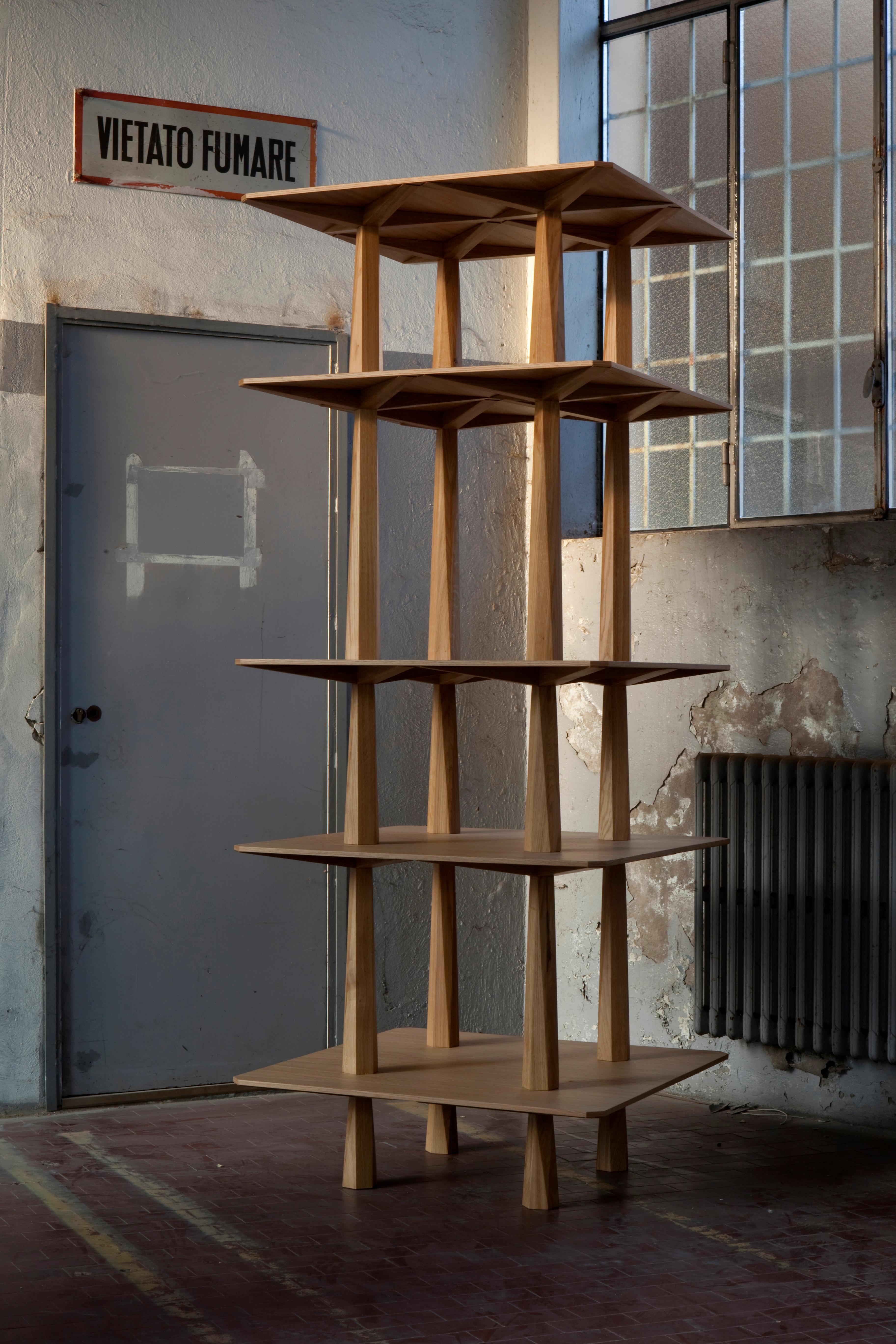 Centina TOTEM shelves by Oeuffice
Edition: 8 + 2AP
2011
Dimensions: 86 x 86 x 205 cm
Materials: Solid handcrafted stained oak

The Centina TOTEM reveals in a smaller scale the aesthetic fascination
of concrete bearing structures in