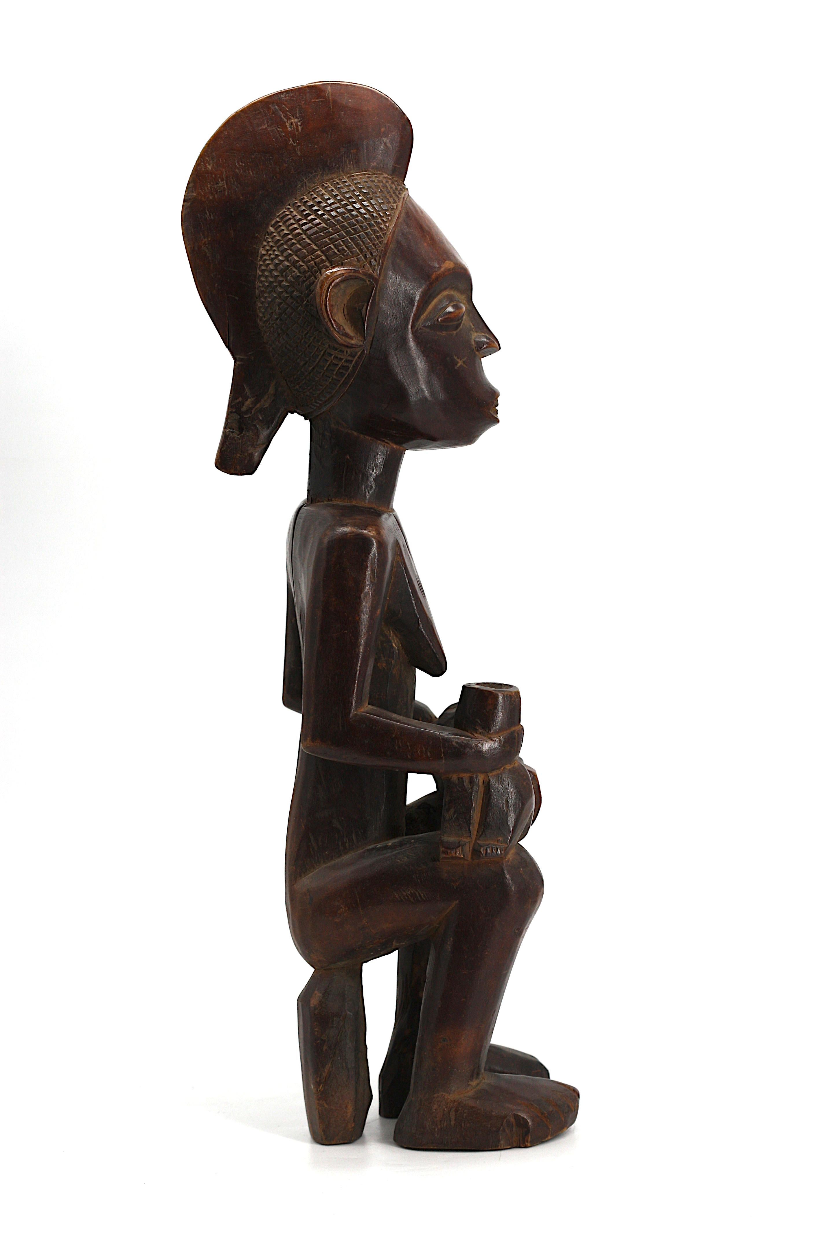 
Figura di maternità in Wood dell'Africa centrale
La madre seduta con il bambino.
Altezza 16 pollici, larghezza 4,5 pollici, profondità 5 pollici.